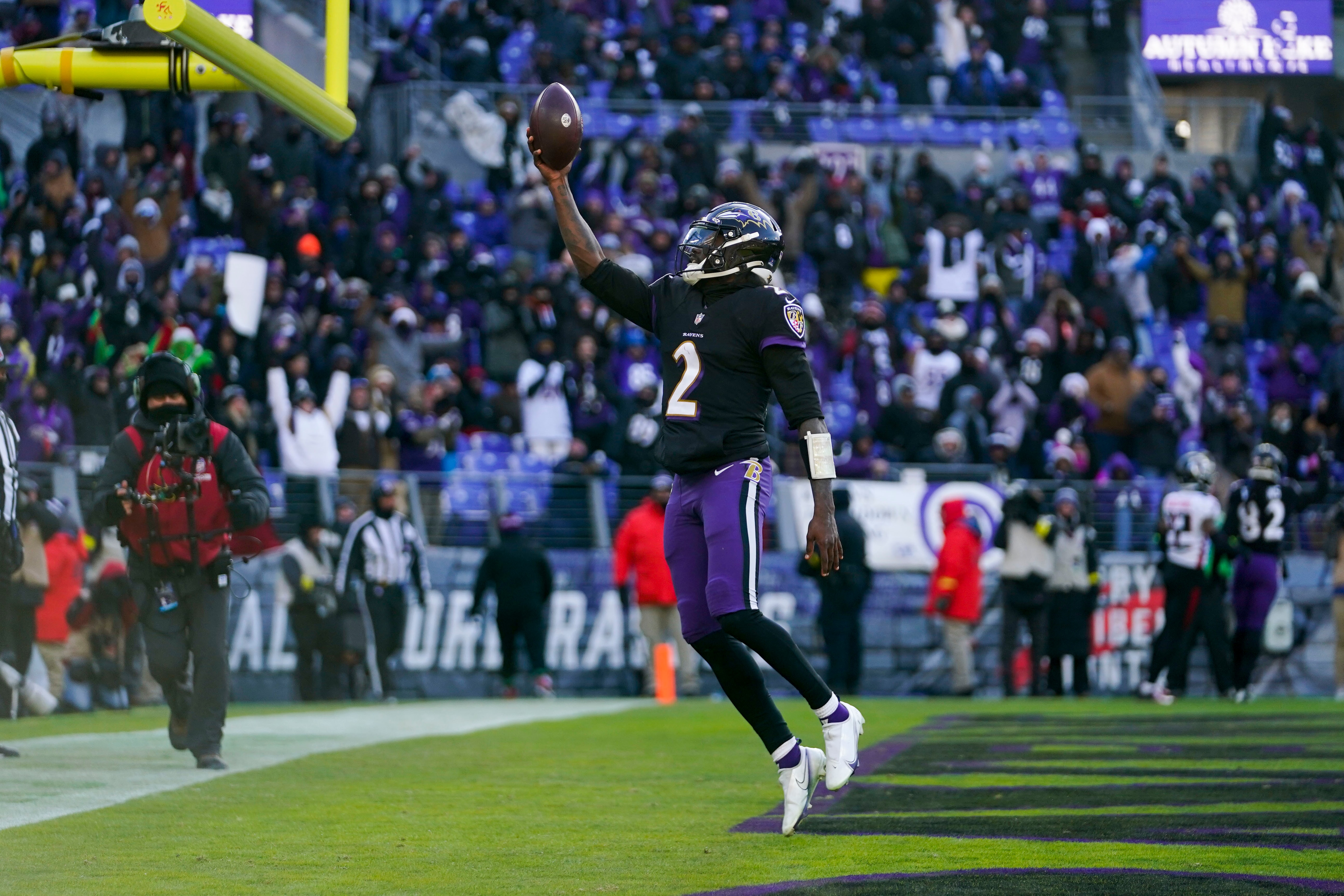 Baltimore Ravens quarterback Tyler Huntley (2) celebrates his 2-point conversion during the first half of an NFL football game against the Atlanta Falcons, Saturday, Dec. 24, 2022, in Baltimore.