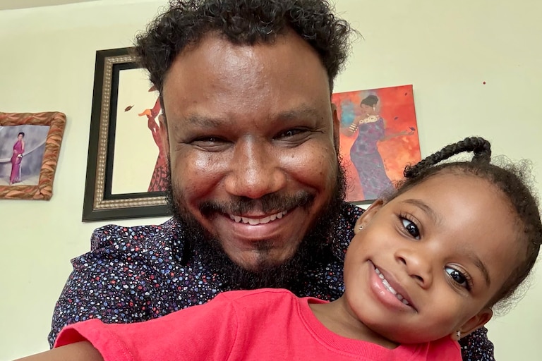 Anthony Tilghman and his daughter.