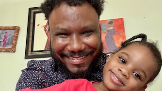 Anthony Tilghman and his daughter.
