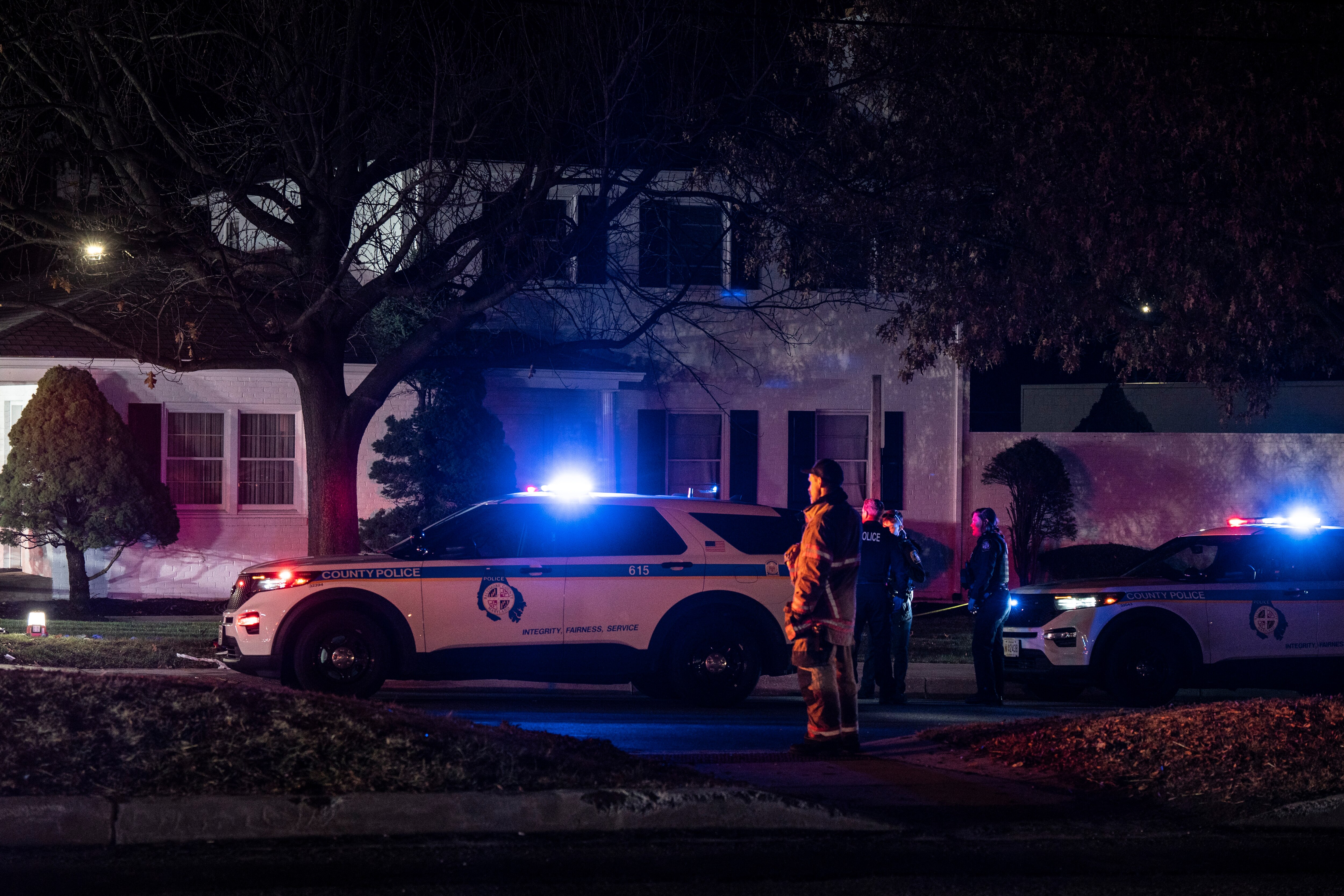 Police and other emergency vehicles respond to a shooting at the 8500 block of Loch Raven Boulevard in Towson.