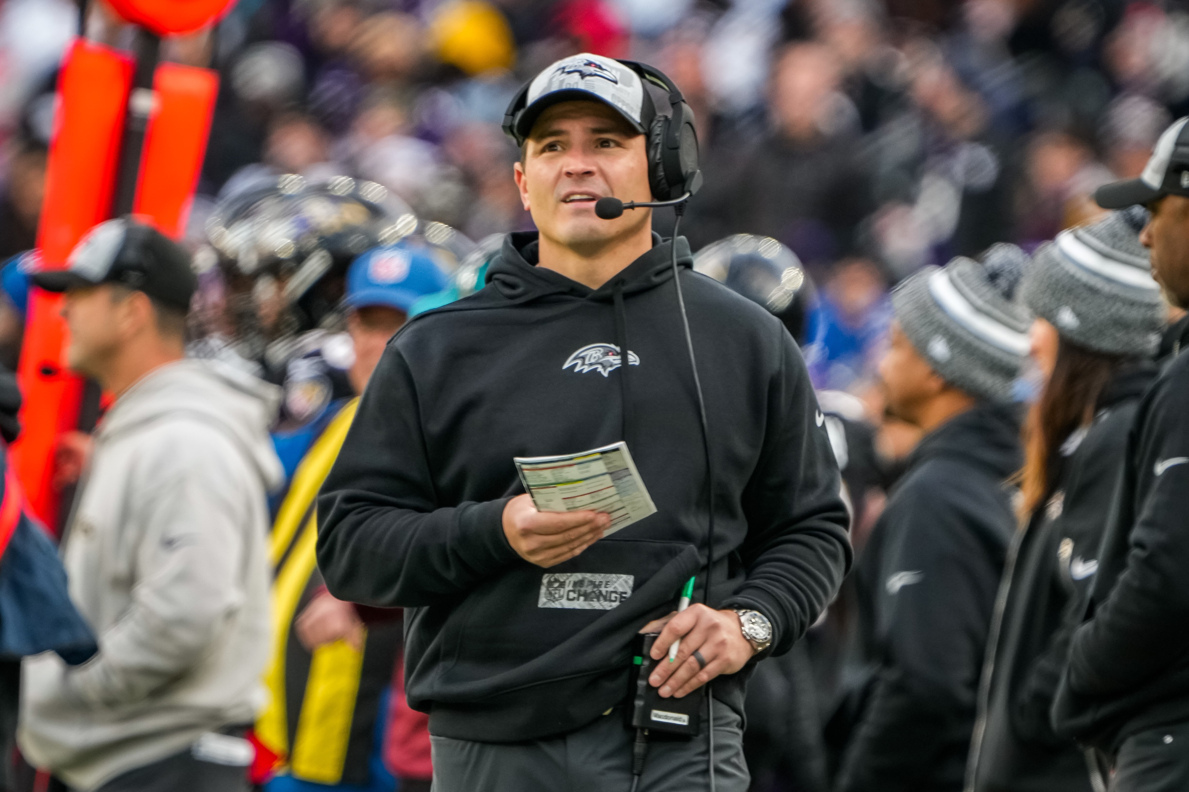 Baltimore Ravens defensive coordinator Mike Macdonald watches the game against the Miami Dolphins at M&T Bank Stadium on Sunday, Dec. 31, 2023.