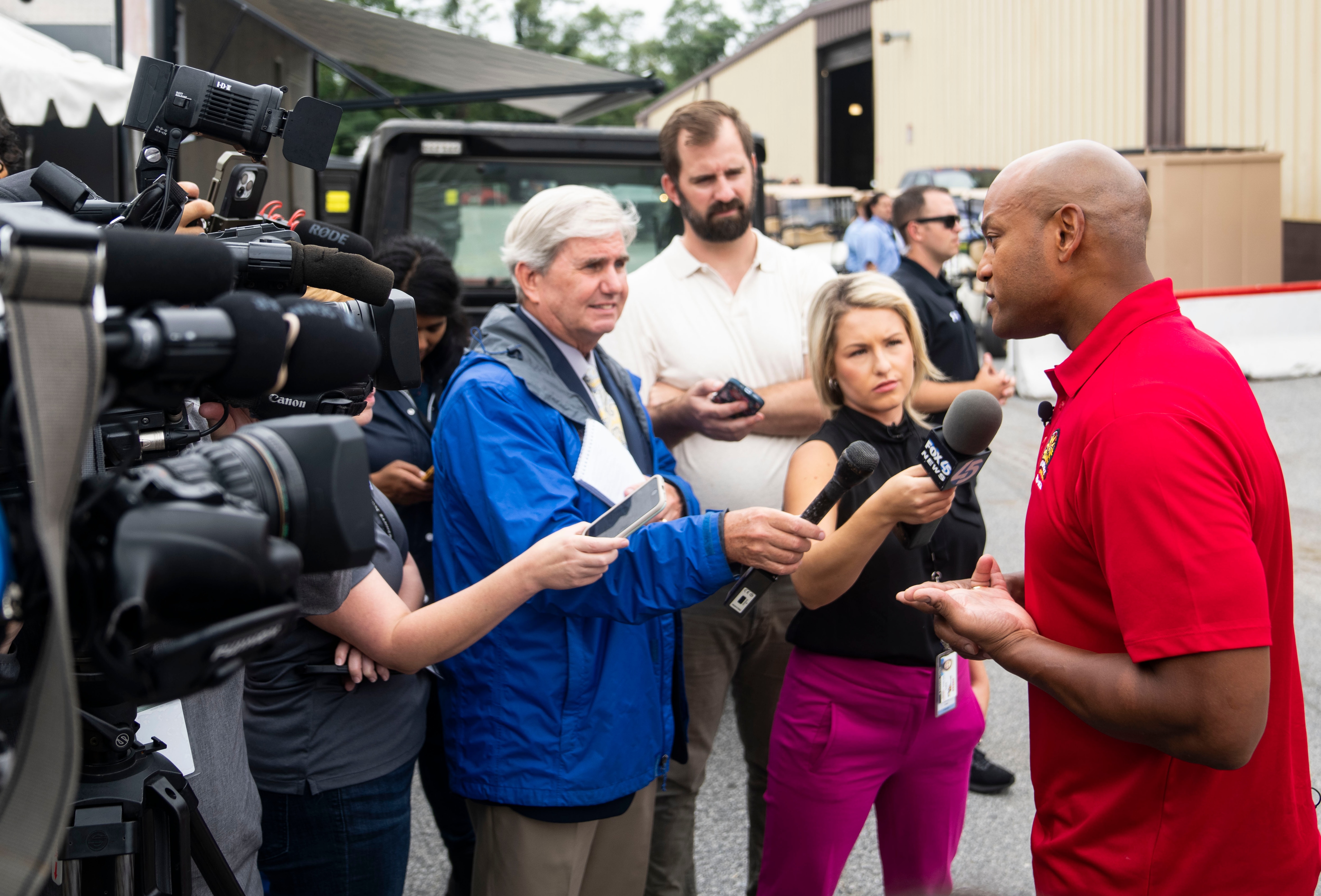 Maryland Gov. Wes Moore speaks with reporters at the Maryland State Fair in Timonium on Aug. 30, 2024.