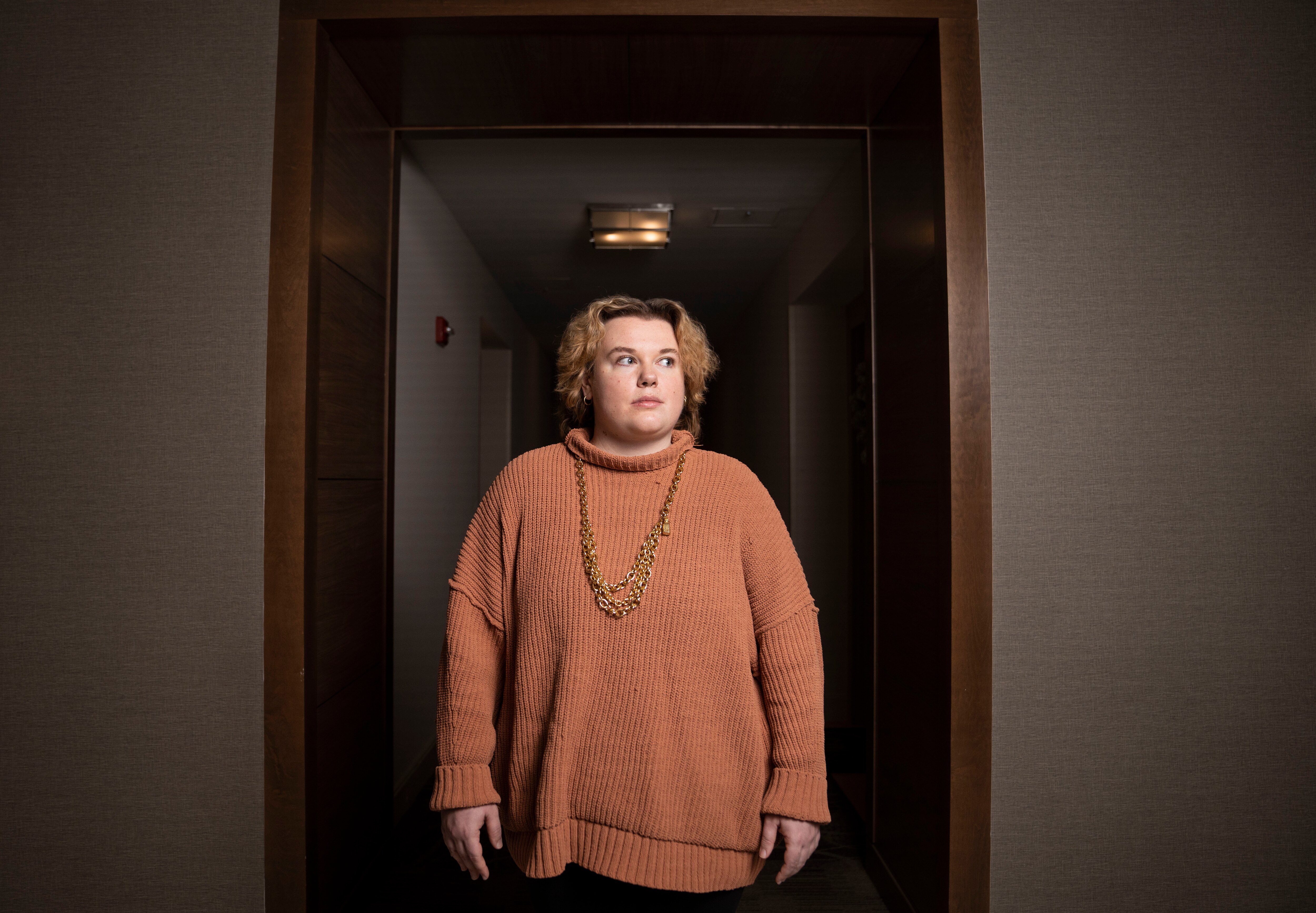 Lydia Moore poses for a portrait inside of her apartment complex, in Baltimore, Wednesday, December 14,2022,