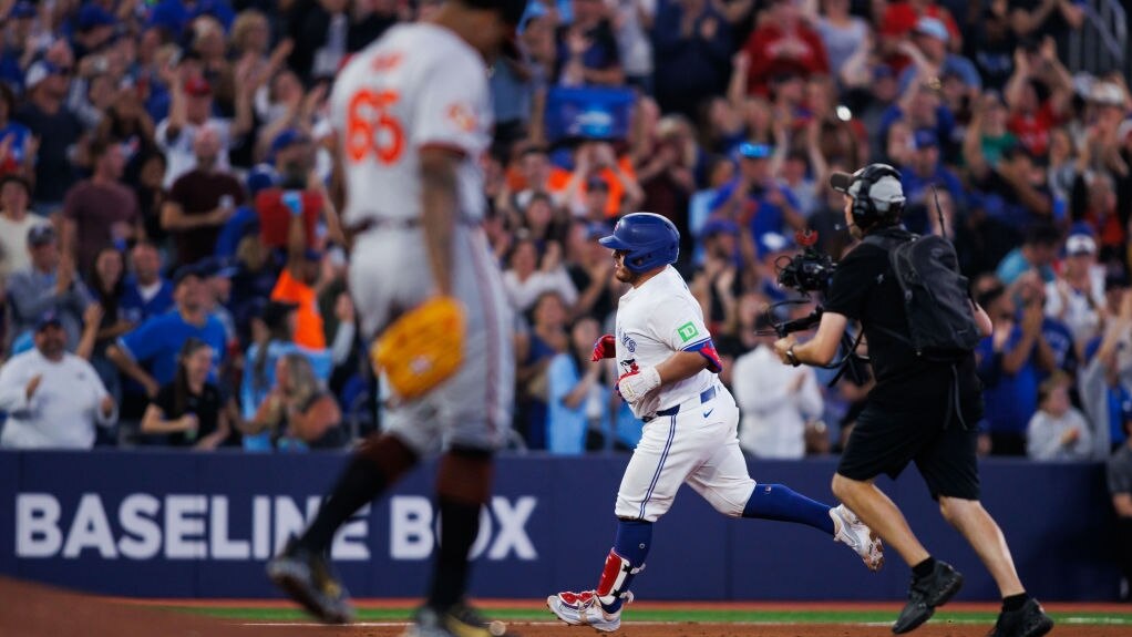TORONTO, CANADA - AUGUST 6: Alejandro Kirk #30 of the Toronto Blue Jays runs out a three-run home run to score in Vladimir Guerrero Jr. #27 and Spencer Horwitz #48 in the sixth inning of their MLB game against the Baltimore Orioles at Rogers Centre on August 6, 2024 in Toronto, Ontario, Canada. (Photo by Cole Burston/Getty Images)