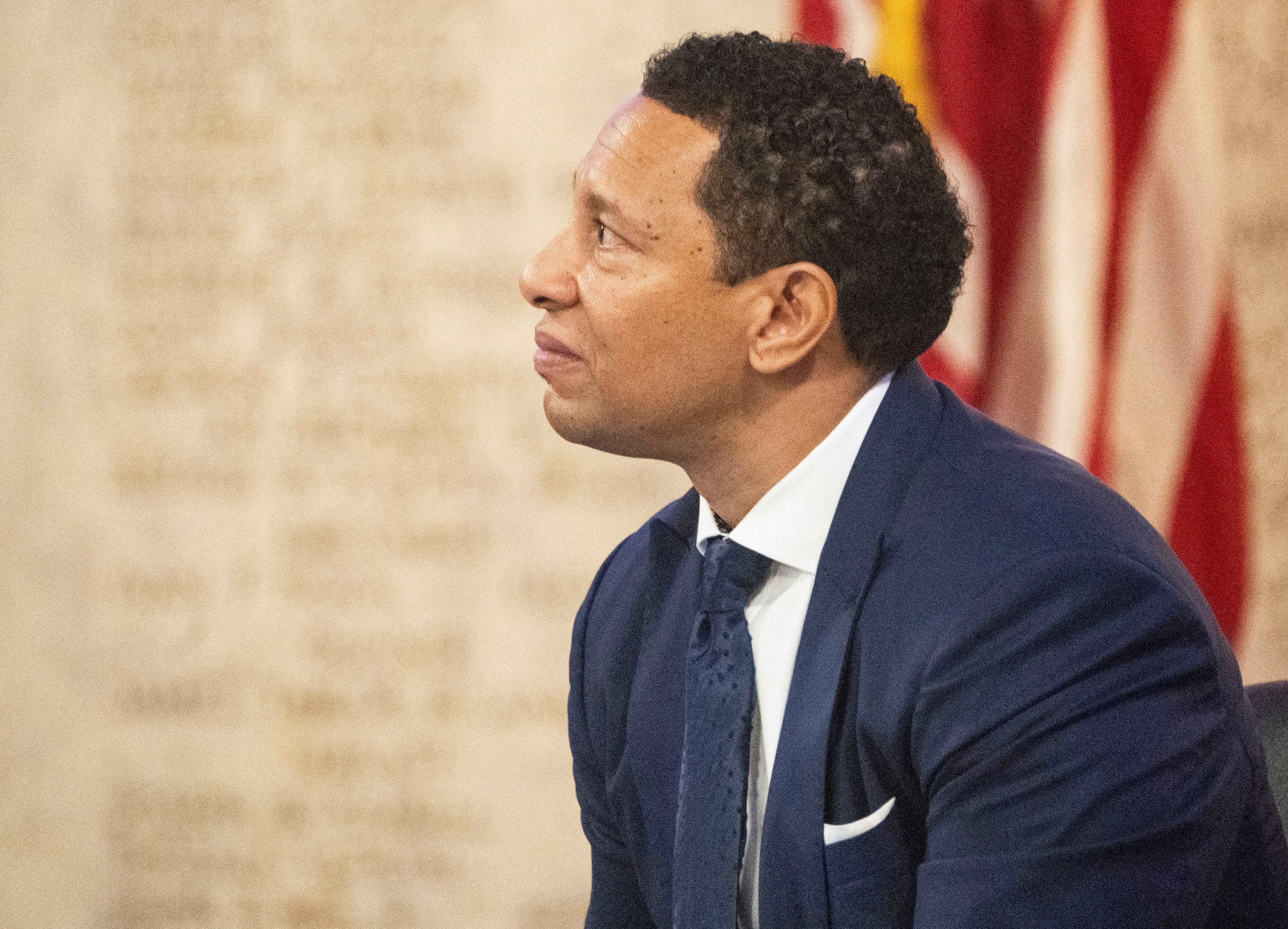 In this photo from Jan. 3, 2023, Baltimore State’s Attorney Ivan Bates listens to speakers during his inauguration at the Baltimore War Memorial.