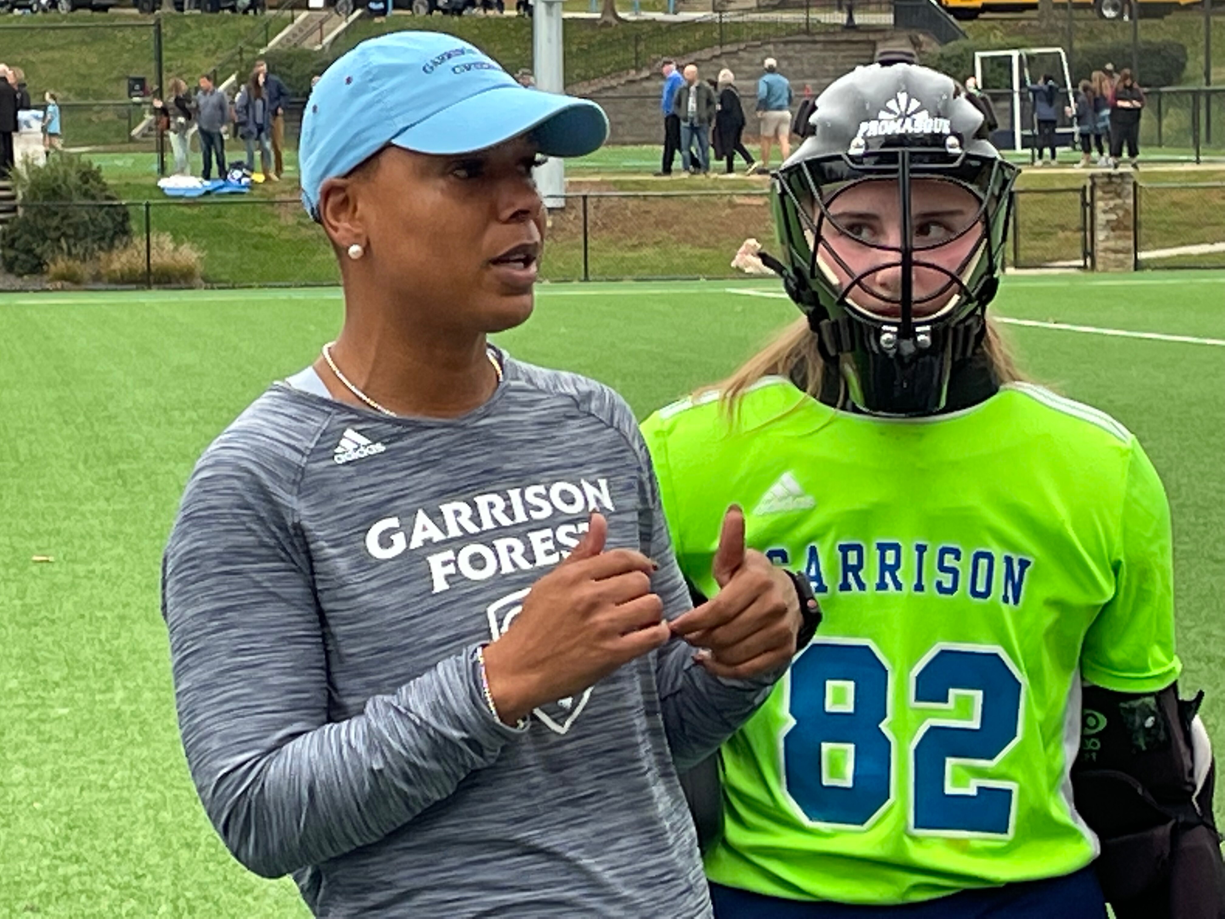 Garrison Forest goalie Alyssa Klebasko listens to coach Mimi Smith before the Grizzlies 2-1 overtime victory against Archbishop Spalding Tuesday afternoon. Klebasko, a senior headed for Maryland, had seven saves in the game and has allowed only three goals to A Conference opponents this season.