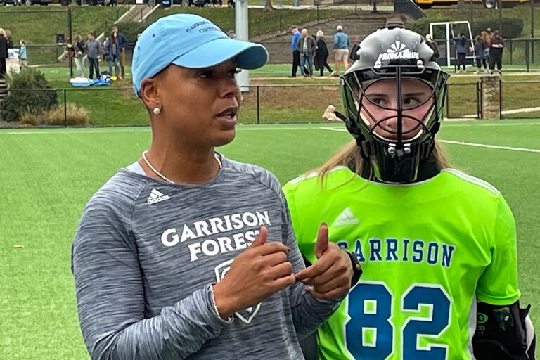 Garrison Forest goalie Alyssa Klebasko listens to coach Mimi Smith before the Grizzlies 2-1 overtime victory against Archbishop Spalding Tuesday afternoon. Klebasko, a senior headed for Maryland, had seven saves in the game and has allowed only three goals to A Conference opponents this season.