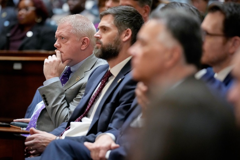 House Minority Leader Jason Buckel, left, listens as Gov. Wes Moore delivers his annual State of the State address in the Maryland State House in Annapolis, Md. on Wednesday, February 5, 2025.