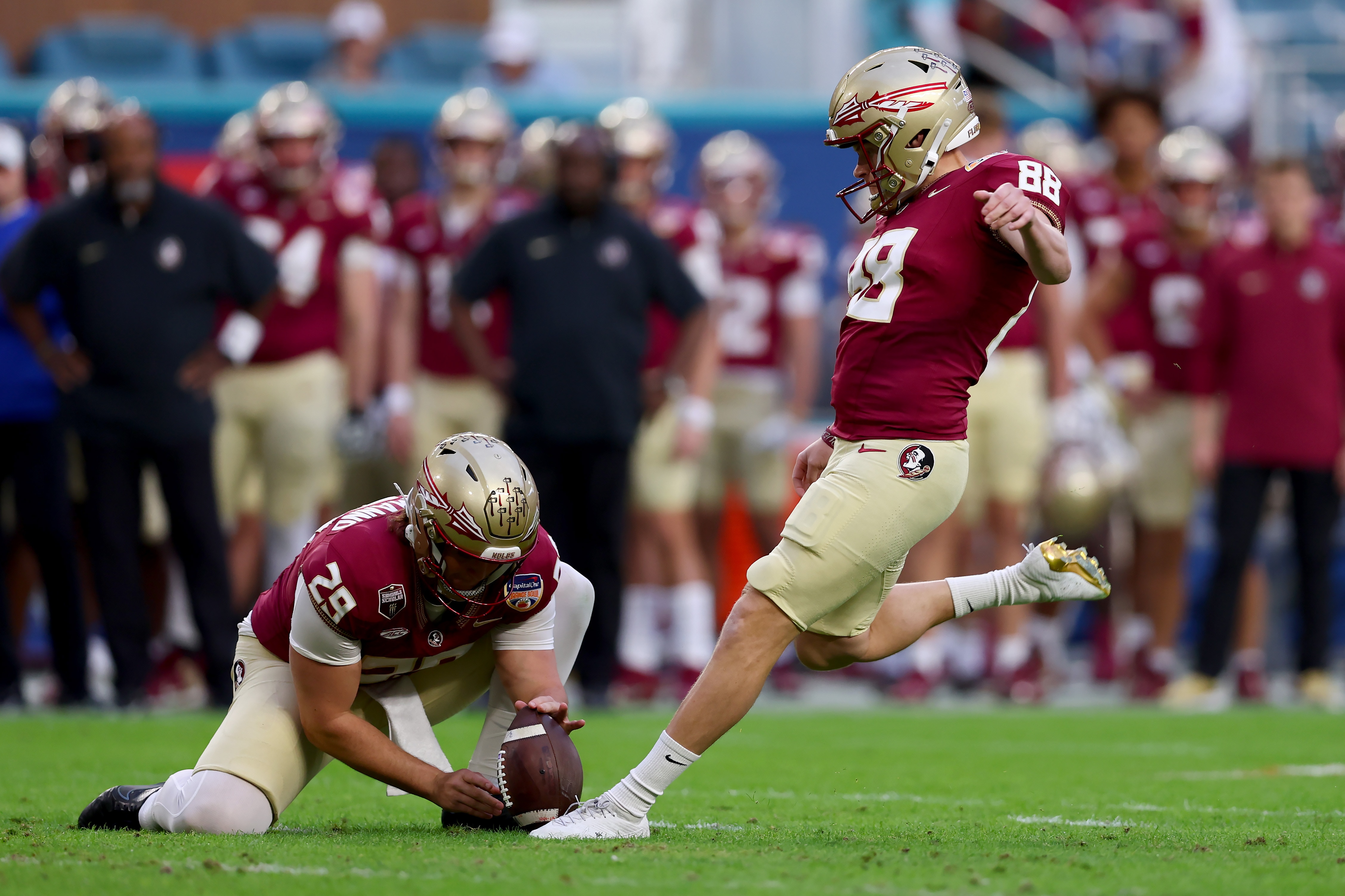 MIAMI GARDENS, FLORIDA - DECEMBER 30: Ryan Fitzgerald #88 of the Florida State Seminoles kicks a field goal in the second quarter against the Georgia Bulldogs during the Capital One Orange Bowl at Hard Rock Stadium on December 30, 2023 in Miami Gardens, Florida.