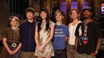 SATURDAY NIGHT LIVE -- Episode 1906 -- Pictured: Host Dakota Johnson (center) with musical guest Turnstile during Promos on Thursday, October 1, 2026 -- (Photo by: Rosalind O'Connor/NBC)