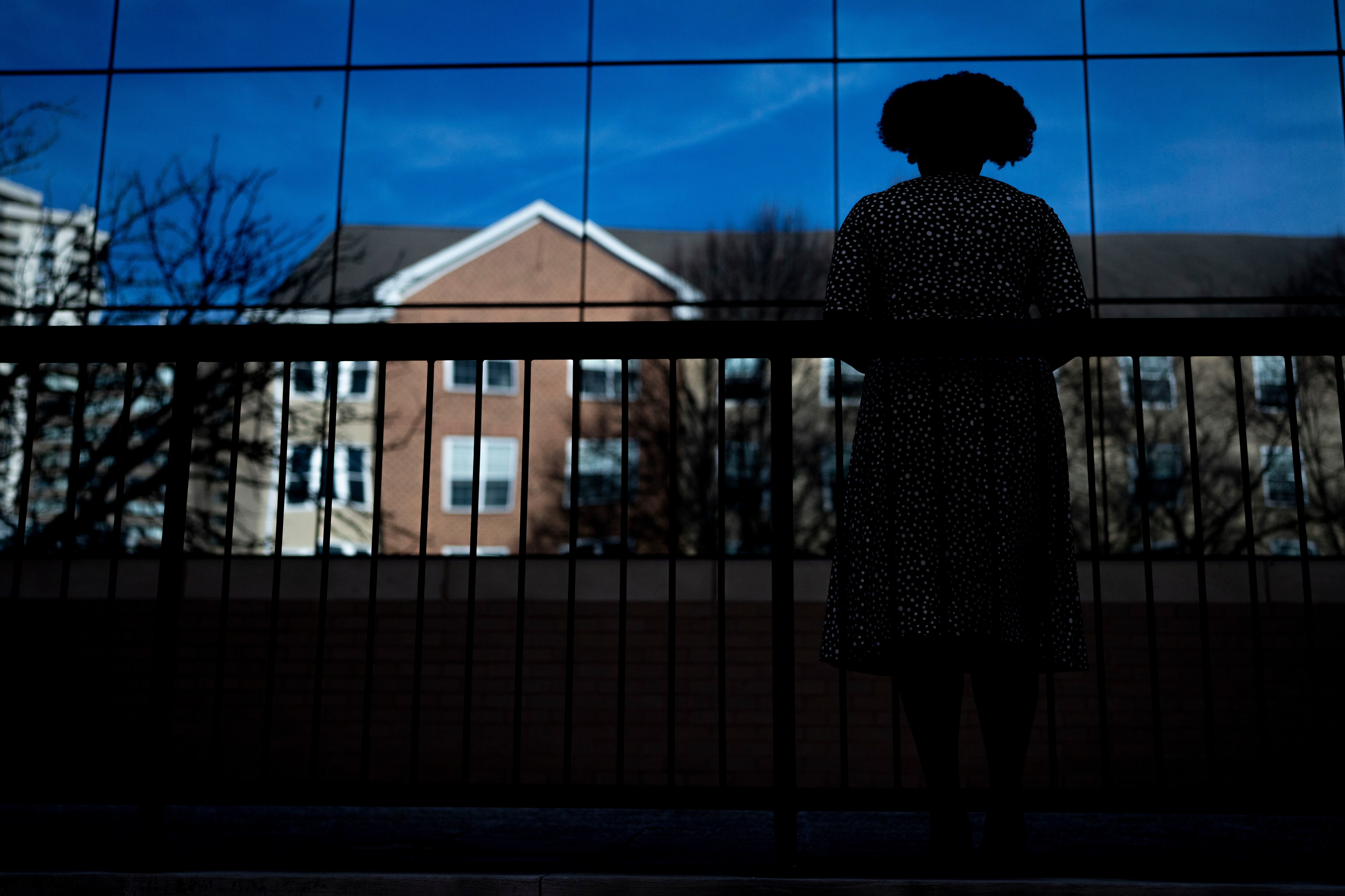 A woman poses for a portrait at Towson District Court Commissioner’s Office, in Towson, Thursday, December 18, 2025. The woman was there to file the paperwork with the county and try to convince the Baltimore County Commissioner to arrest her rapist in order to re-open the case.