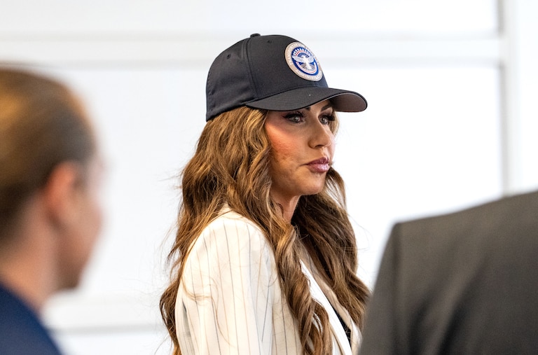 ARLINGTON, VA - JULY 8: U.S. Secretary of Homeland Security Kristi Noem departs a news conference at Ronald Reagan Washington National Airport on July 8, 2025 in Arlington, Virginia. For the first time in nearly two decades, the TSA is easing its shoe removal rule introduced five years after a 2001 shoe-bombing attempt by allowing some travelers to keep their shoes on at security checkpoints.
