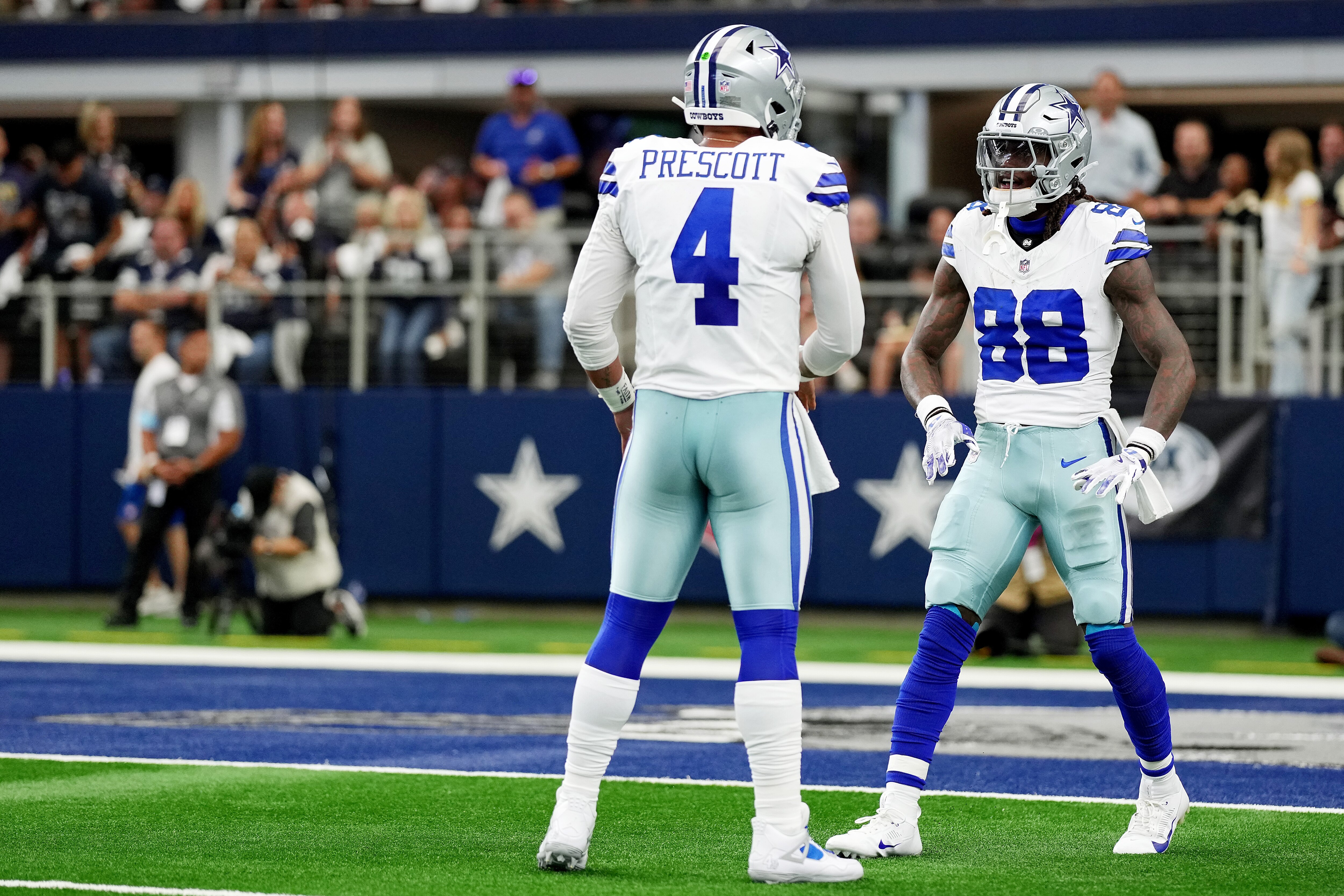 Cowboys quarterback Dak Prescott and wide receiver CeeDee Lamb celebrate a touchdown against the Saints last week.