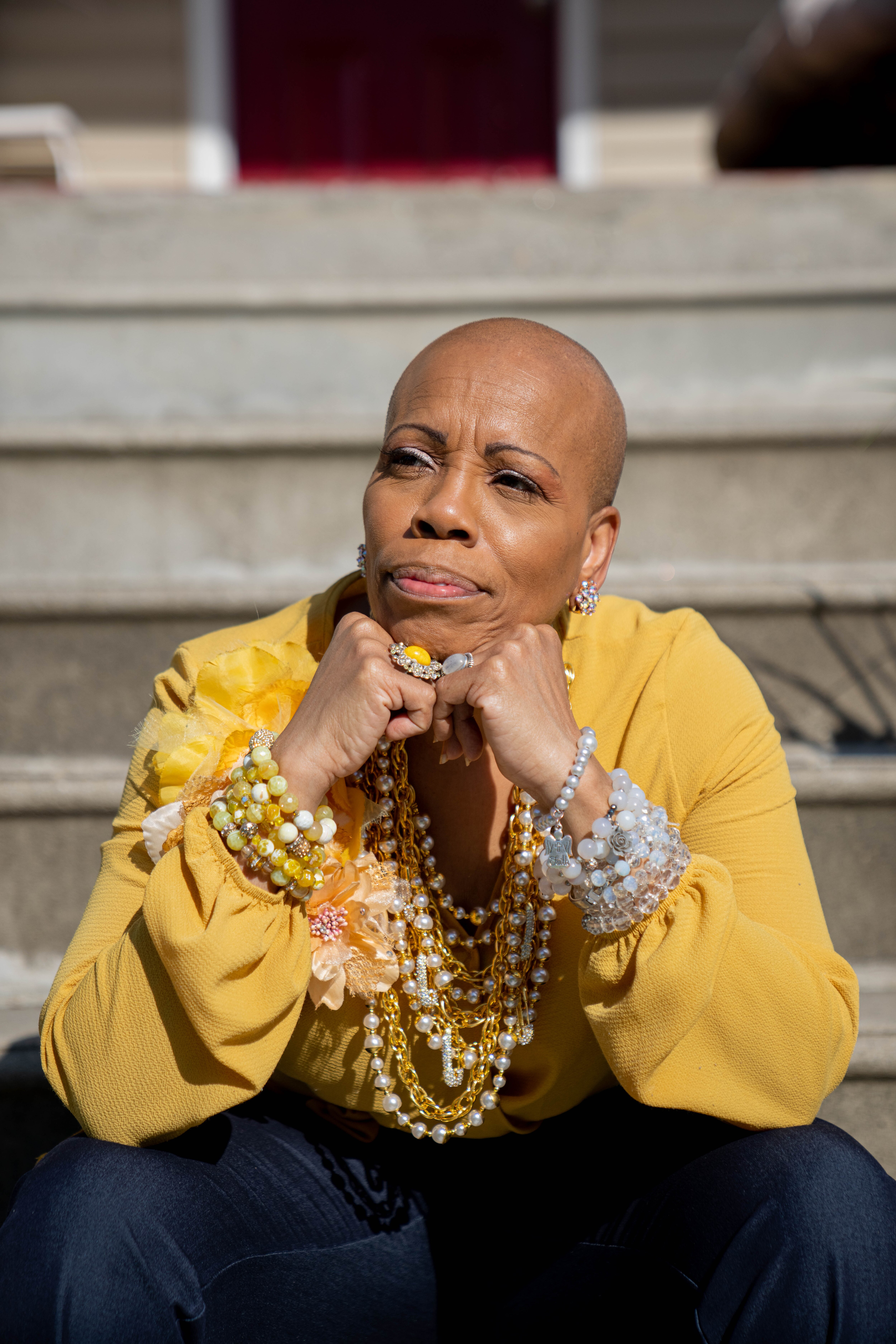 Monique Smith sits for a portrait at her home in Baltimore.