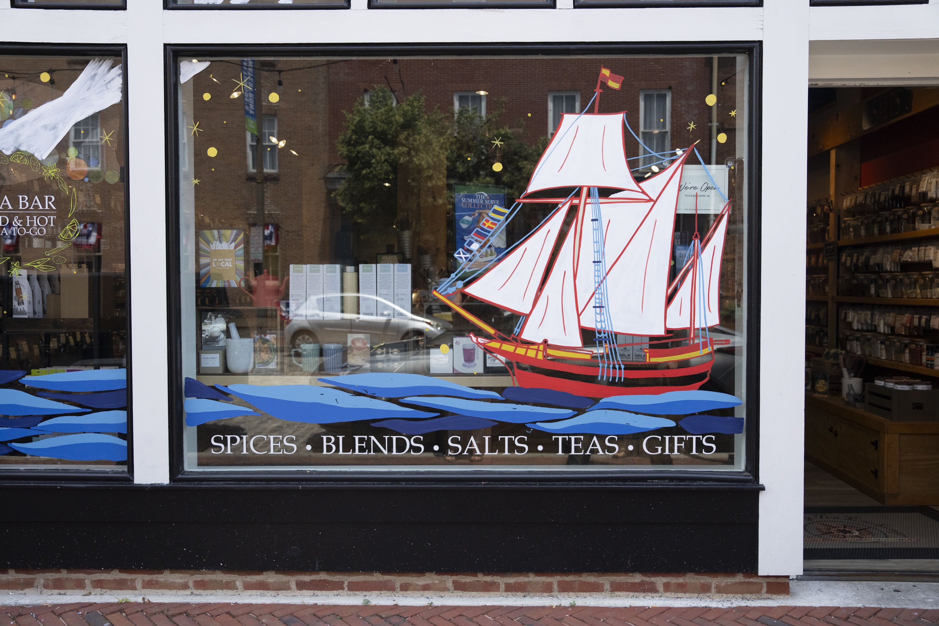 The Spice & Tea Exchange in Fells Point hired an artist to paint its window in honor of the United States’ 250th birthday. 