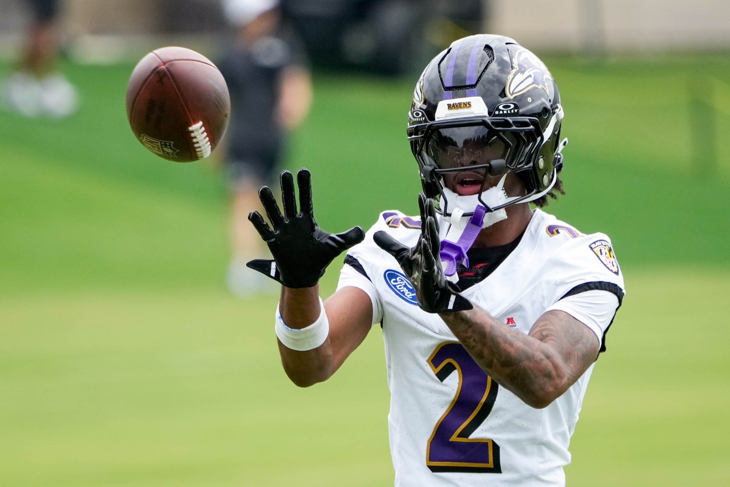 Baltimore Ravens cornerback Nate Wiggins (2) catches a pass during the team’s training camp session at the Under Armour Performance Center in Owings Mills, Md. on Thursday, July 24, 2025.