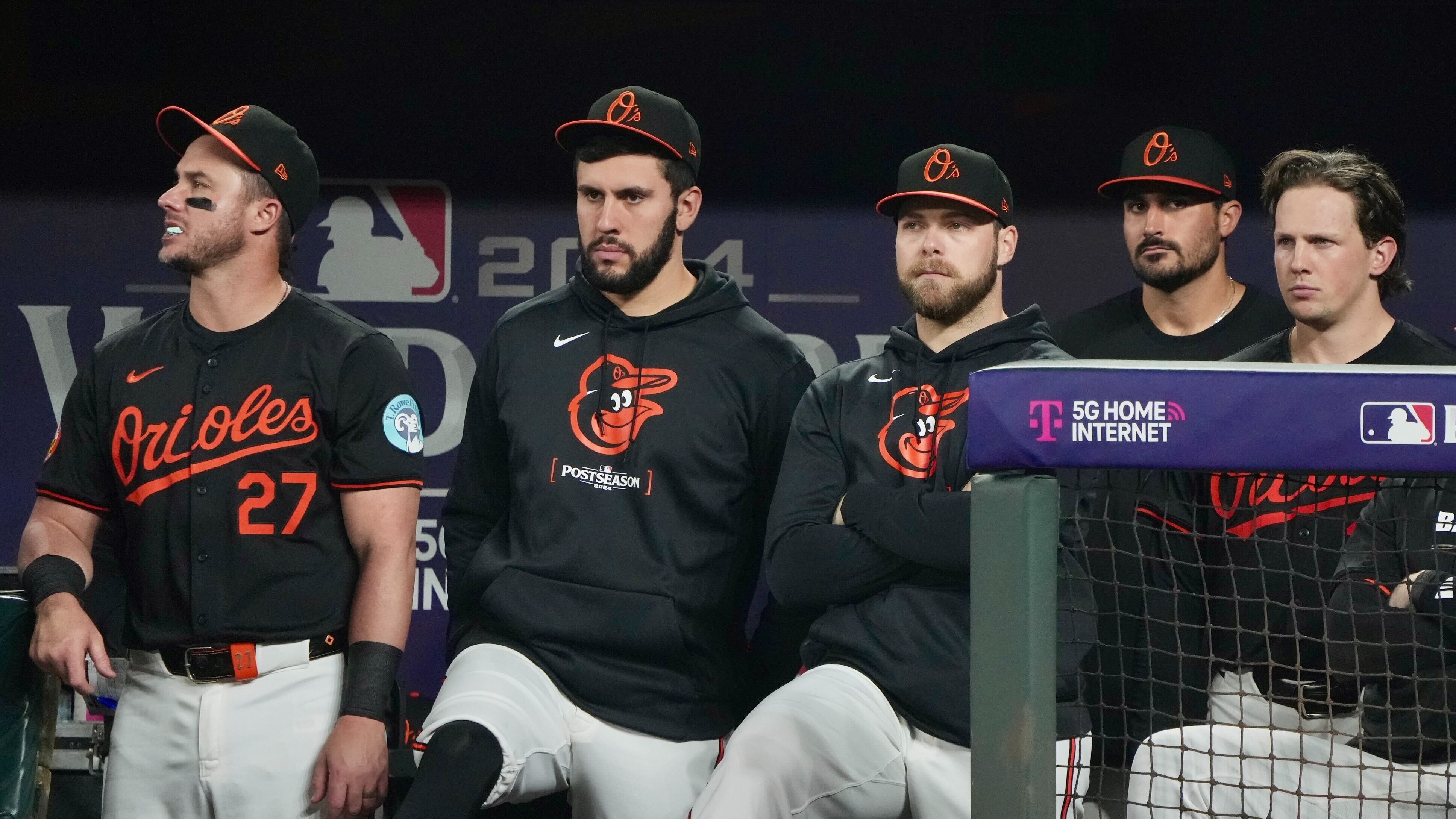 Sullen Orioles players watch Game 2 of the American League Wild Card Series, a 2-1 loss.