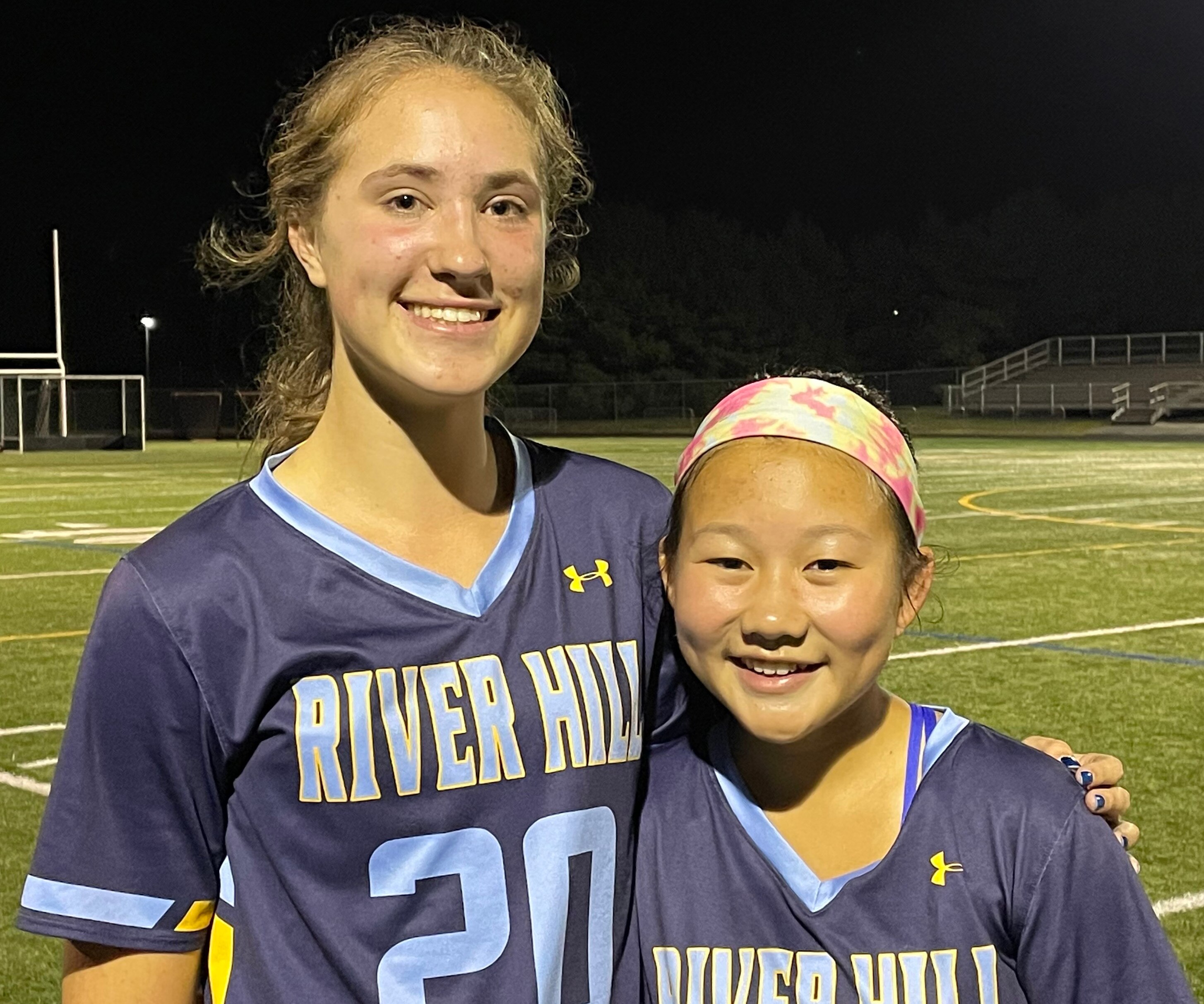 River Hill sophomores Carolyn Dzubak (20) and Lauren Gee are two of the young players the No. 6 Hawks have relied more on as the season has progressed. Dzubak sparked a 5-1 victory over No. 9 Glenelg Wednesday with the first goal and later added an assist while Gee played a stellar midfield game as the Hawks clinched at least a share of the Howard County field hockey championship.