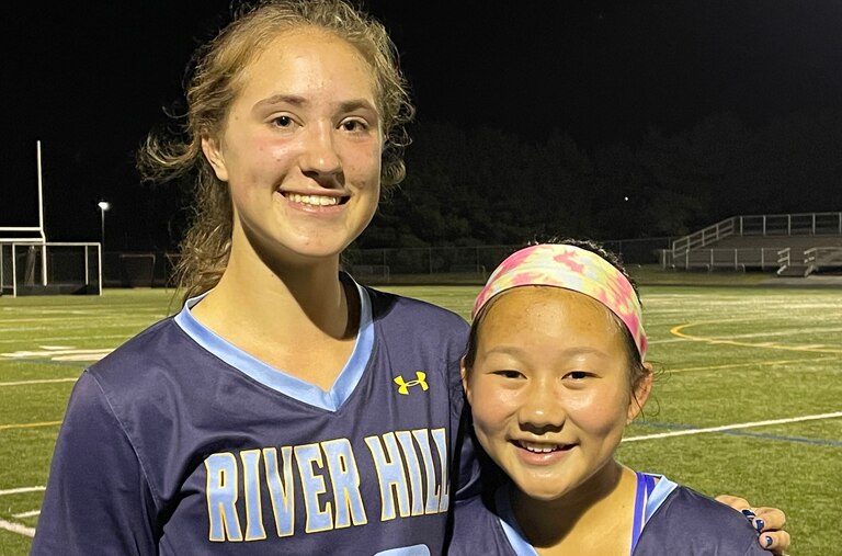 River Hill sophomores Carolyn Dzubak (20) and Lauren Gee are two of the young players the No. 6 Hawks have relied more on as the season has progressed. Dzubak sparked a 5-1 victory over No. 9 Glenelg Wednesday with the first goal and later added an assist while Gee played a stellar midfield game as the Hawks clinched at least a share of the Howard County field hockey championship.
