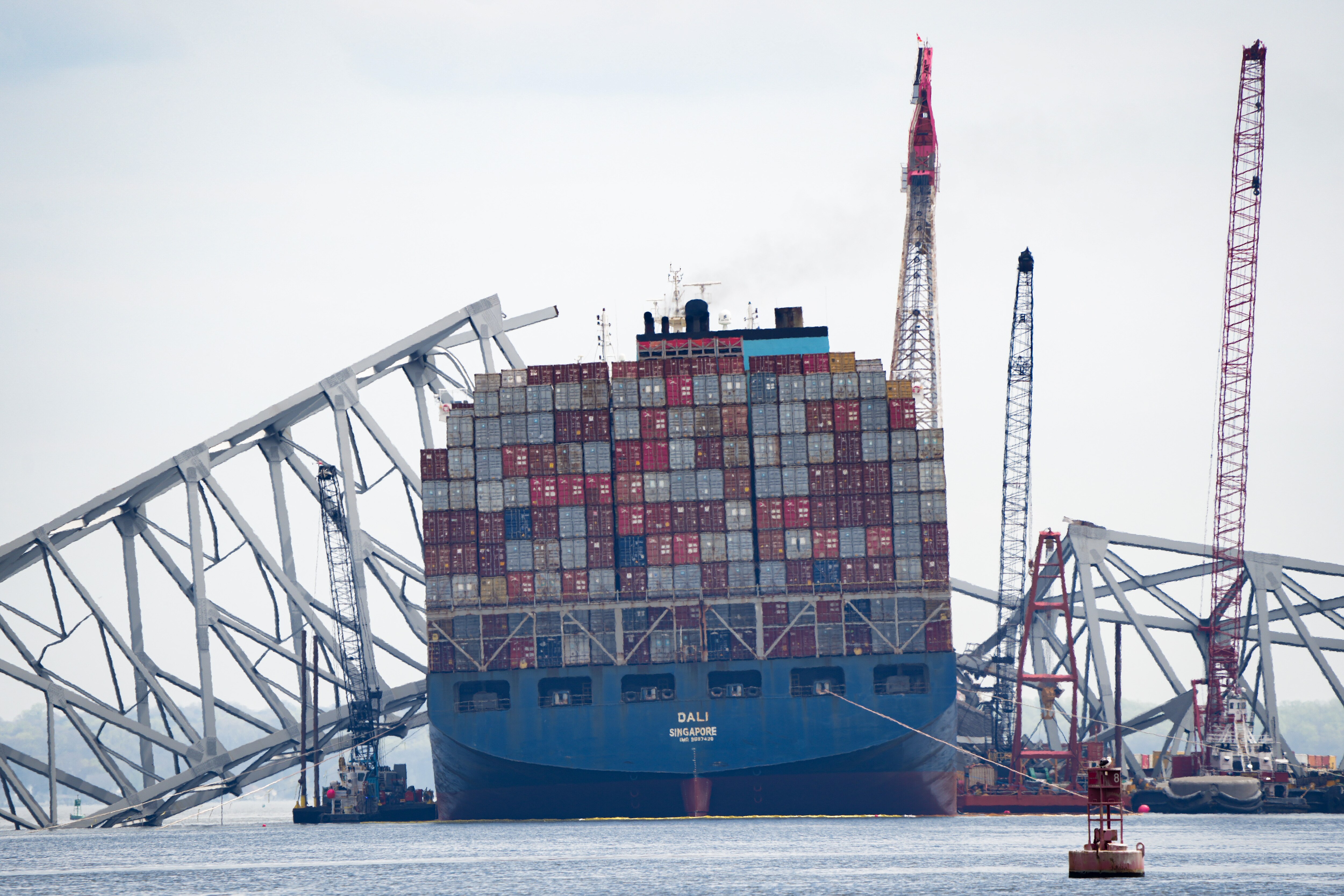 The Dali cargo ship and the collapsed Francis Scott Key Bridge are seen from a Department of Natural Resources boat on the Patapsco River in Baltimore on April 10, 2024.
