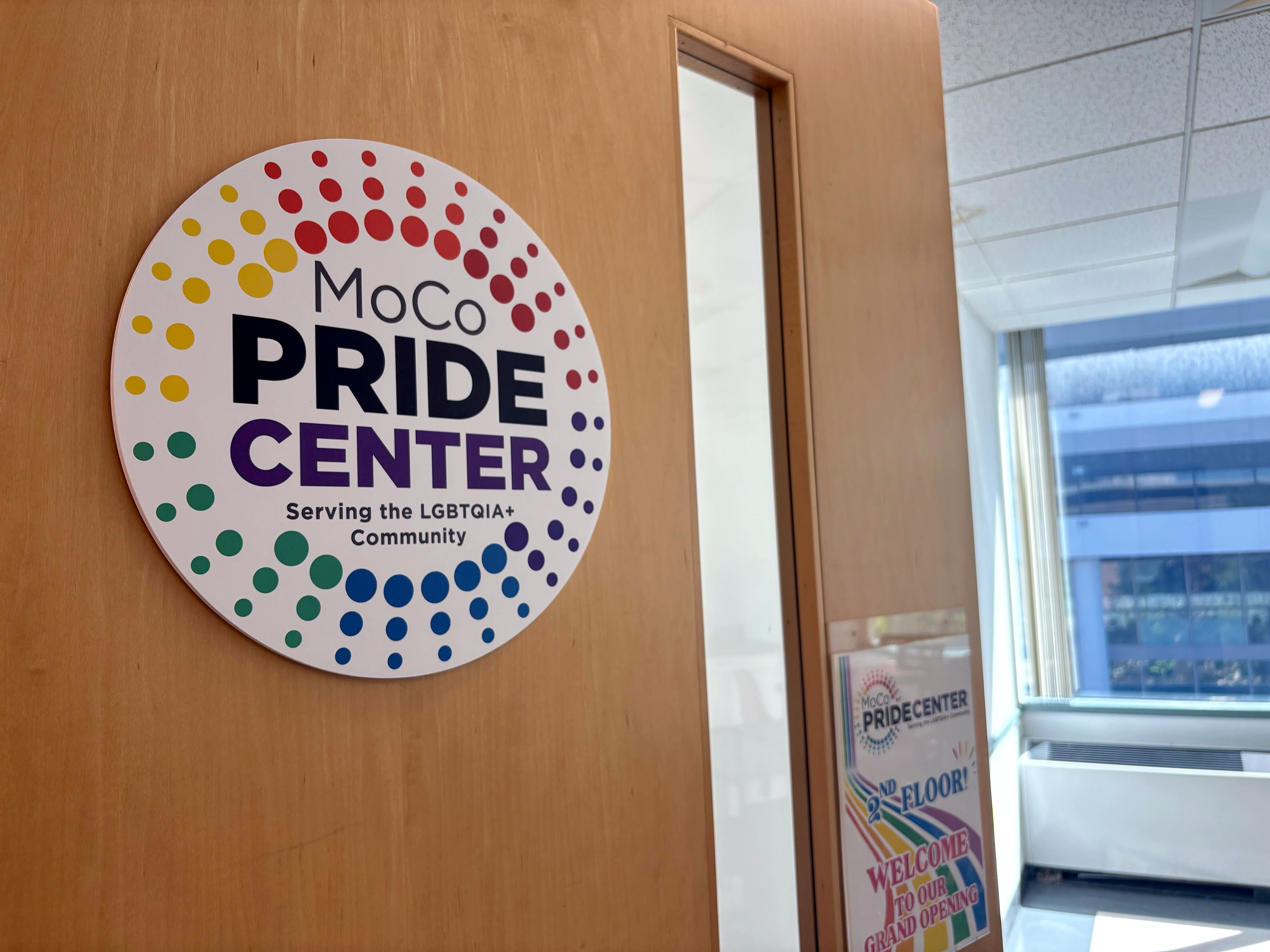 A sign at the door of the MoCo Pride Center’s new physical space, which opened in Bethesda on Aug. 30.