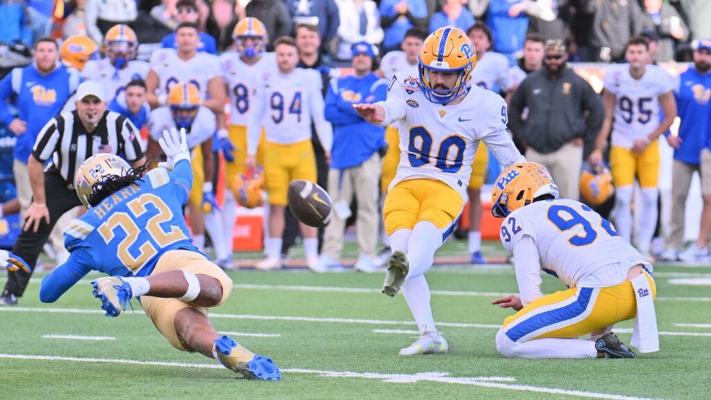 EL PASO, TEXAS - DECEMBER 30: Place kicker Ben Sauls #90 of the Pittsburgh Panthers kicks the game-winning field goal during the second half of the Tony the Tiger Sun Bowl game at Sun Bowl Stadium on December 30, 2022 in El Paso, Texas. The Panthers defeated the Bruins 37-35. (Photo by Sam Wasson/Getty Images)