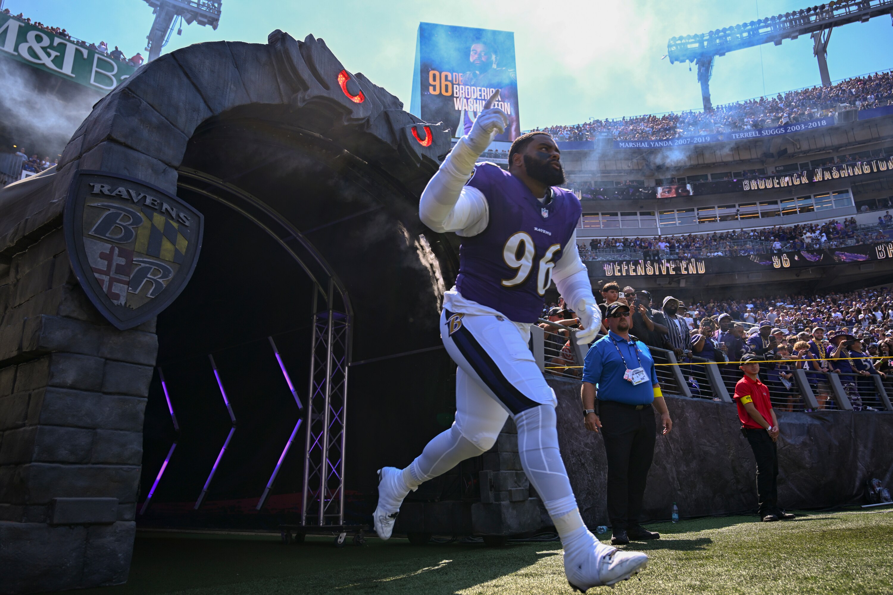 Baltimore Ravens defensive tackle Broderick Washington Jr. runs onto the field ahead of a game against the Cleveland Browns in early September.