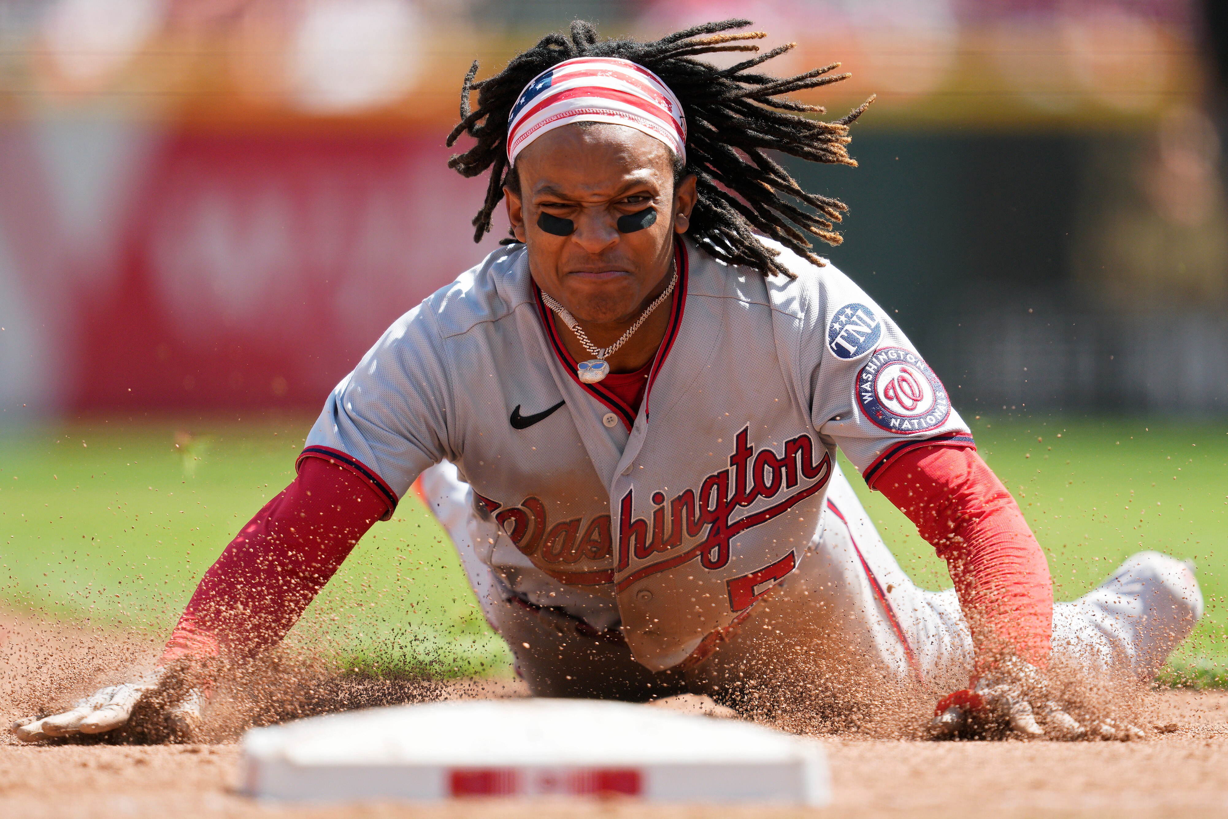 CJ Abrams, who was 4-for-5 with a home run and two steals, reaches third base on a throwing error.