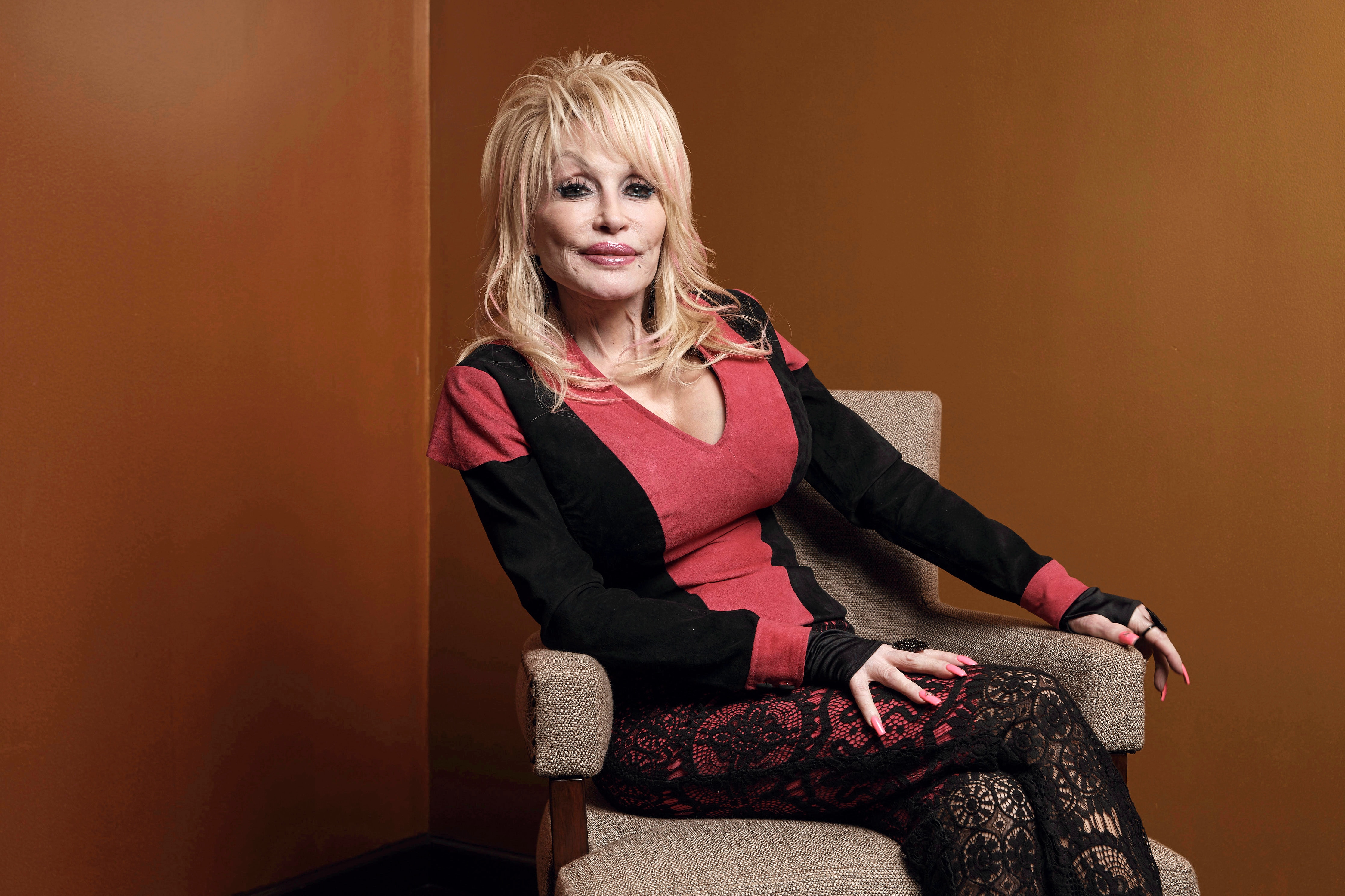 FILE - Dolly Parton poses at the Carnegie Medal of Philanthropy Ceremony in New York, on Oct. 13, 2022. (AP Photo/Andres Kudacki, File)
