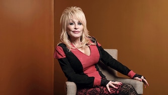 FILE - Dolly Parton poses at the Carnegie Medal of Philanthropy Ceremony in New York, on Oct. 13, 2022. (AP Photo/Andres Kudacki, File)