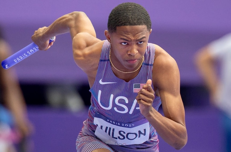 PARIS, FRANCE: AUGUST 09: Quincy Wilson,16, of the United States running the first leg of the Men's 4 x 400m Relay Round 1 Heat 1 during the Athletics Competition at the Stade de France during the Paris 2024 Summer Olympic Games on August 9th, 2024, in Paris, France. (Photo by Tim Clayton/Corbis via Getty Images)