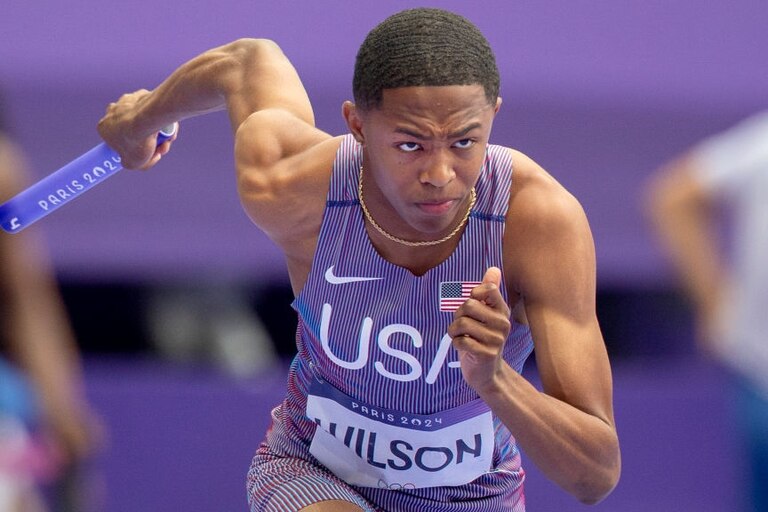 PARIS, FRANCE: AUGUST 09: Quincy Wilson,16, of the United States running the first leg of the Men's 4 x 400m Relay Round 1 Heat 1 during the Athletics Competition at the Stade de France during the Paris 2024 Summer Olympic Games on August 9th, 2024, in Paris, France. (Photo by Tim Clayton/Corbis via Getty Images)