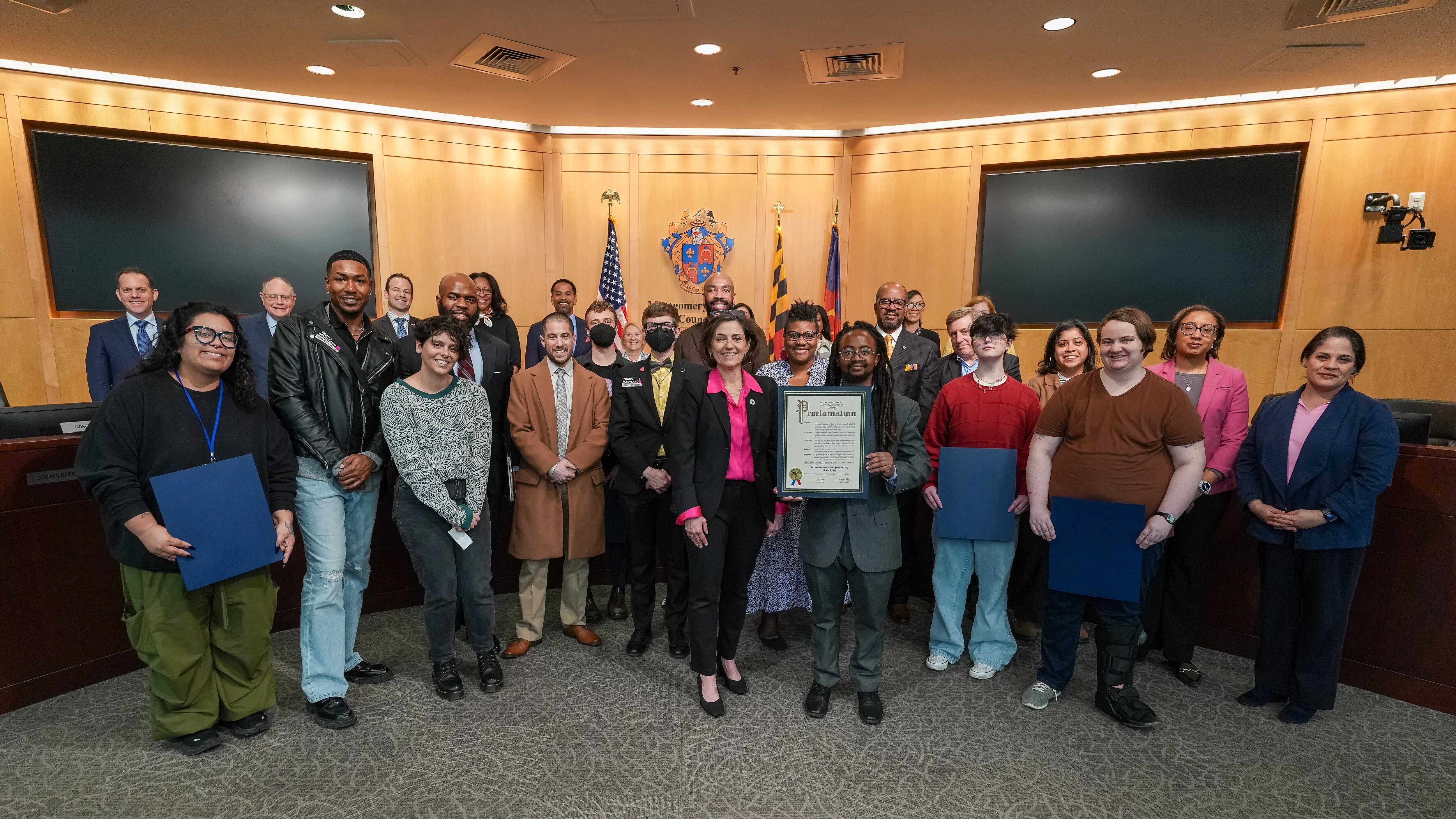 On March 24, 2026, Councilmember Kate Stewart presents a proclamation recognizing Trans Day of Visibility.
