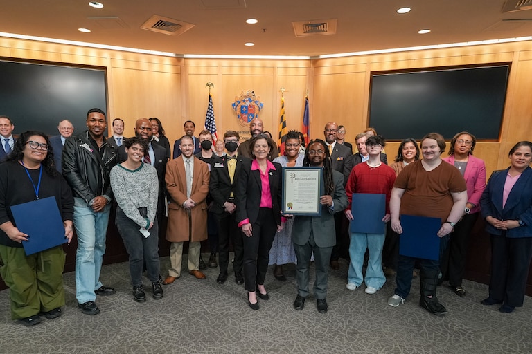 On March 24, 2026, Councilmember Kate Stewart presents a proclamation recognizing Trans Day of Visibility.