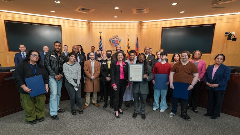 On March 24, 2026, Councilmember Kate Stewart presents a proclamation recognizing Trans Day of Visibility.