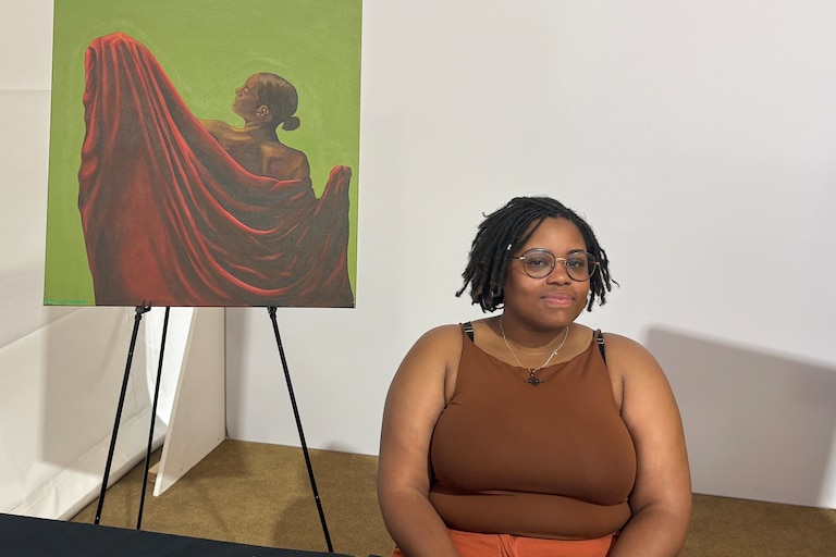 TUESDAY, JUNE 30, 2026 - Baltimore-based artist April Skye Greene displayed her painting in the Maryland tent on Tuesday.