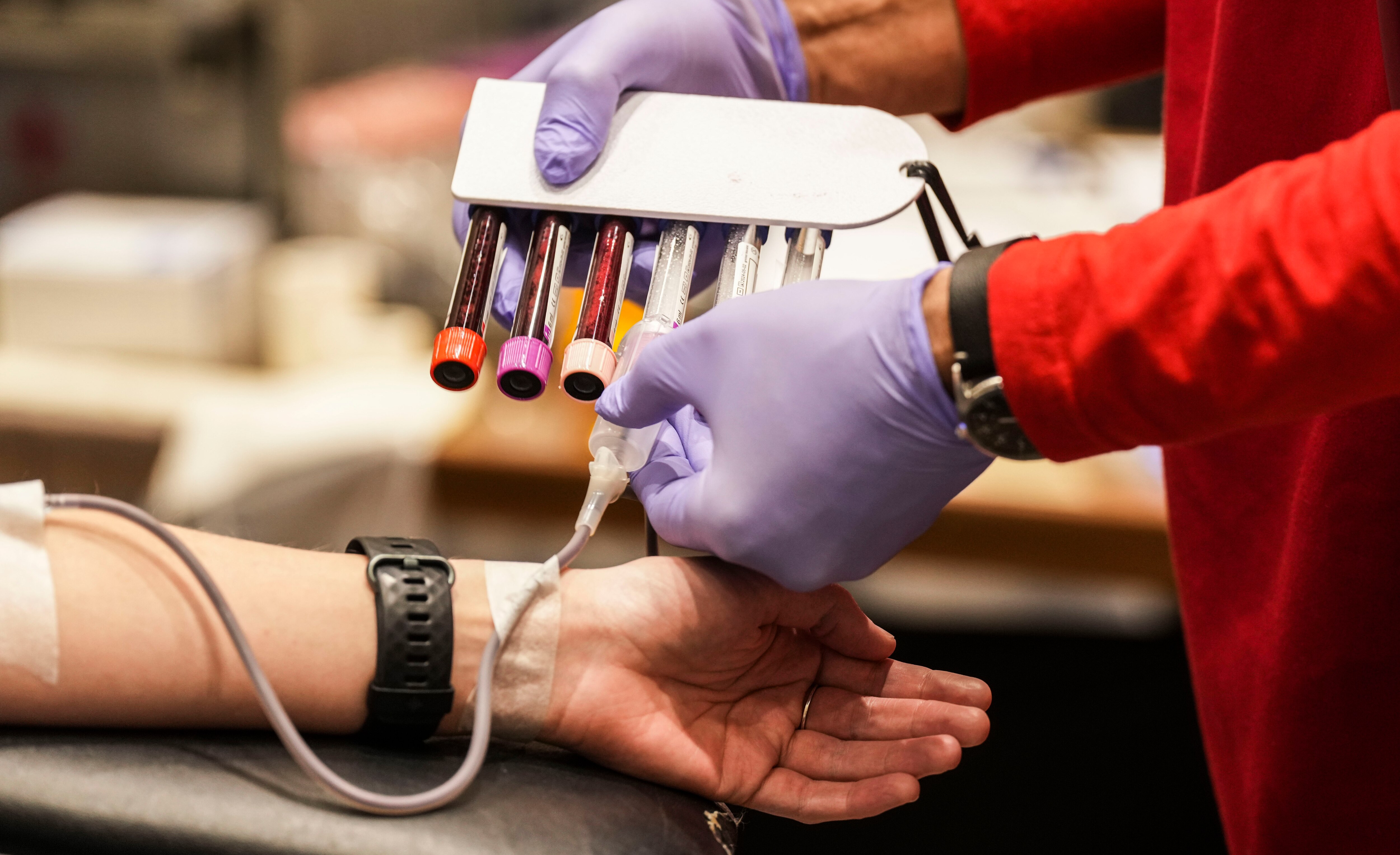 Jillian Pettygrove gets her blood drawn by phlebotomist, Eugene Hankers, during Valentine’s Day Blood Drive by the American Red Cross at Live! Casino & Hotel Maryland, Thursday, February 9, 2023.