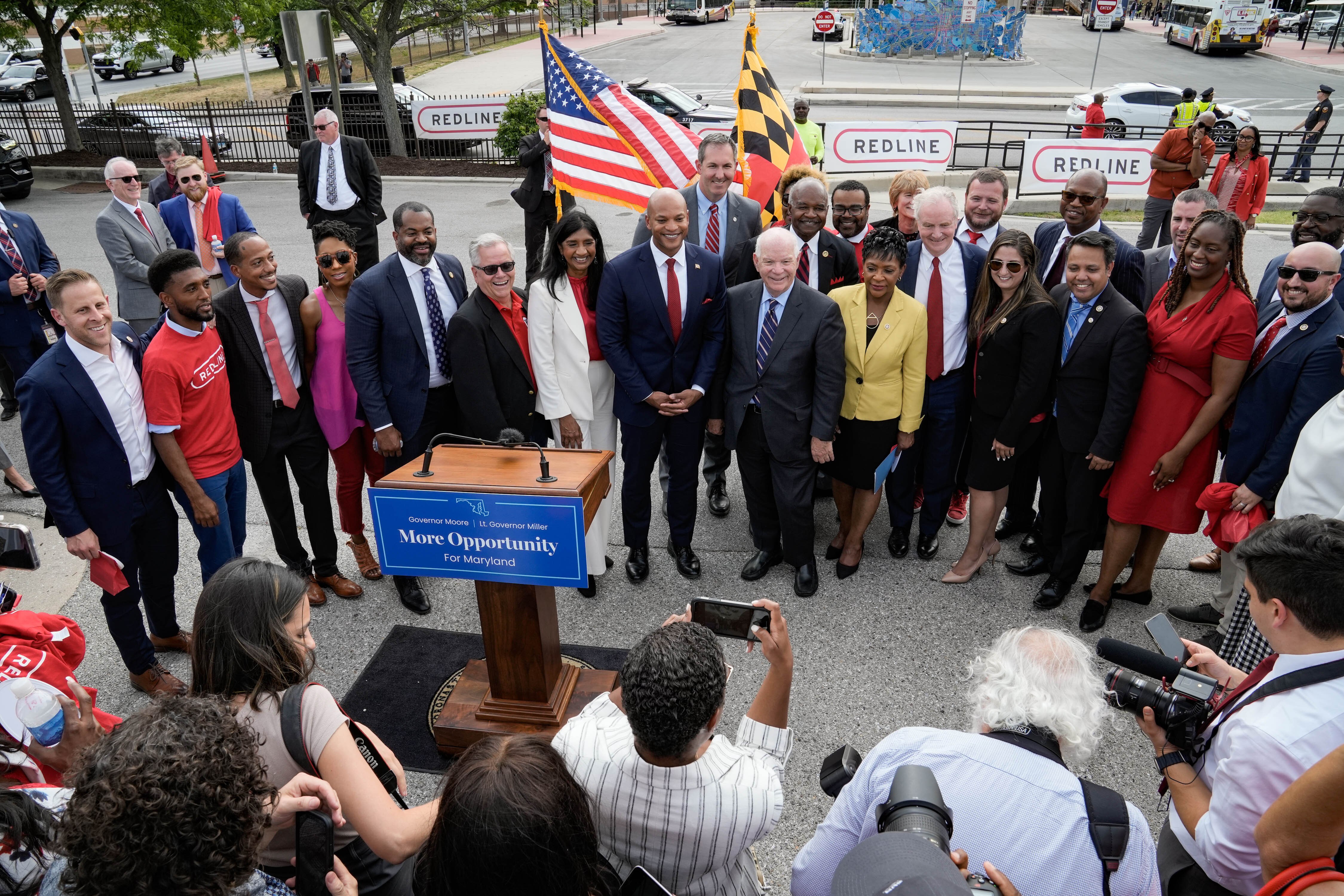 Maryland and Baltimore political leaders stand for a picture after a press conference June 15, 2023, to announce revival of the proposed Red Line transit project.