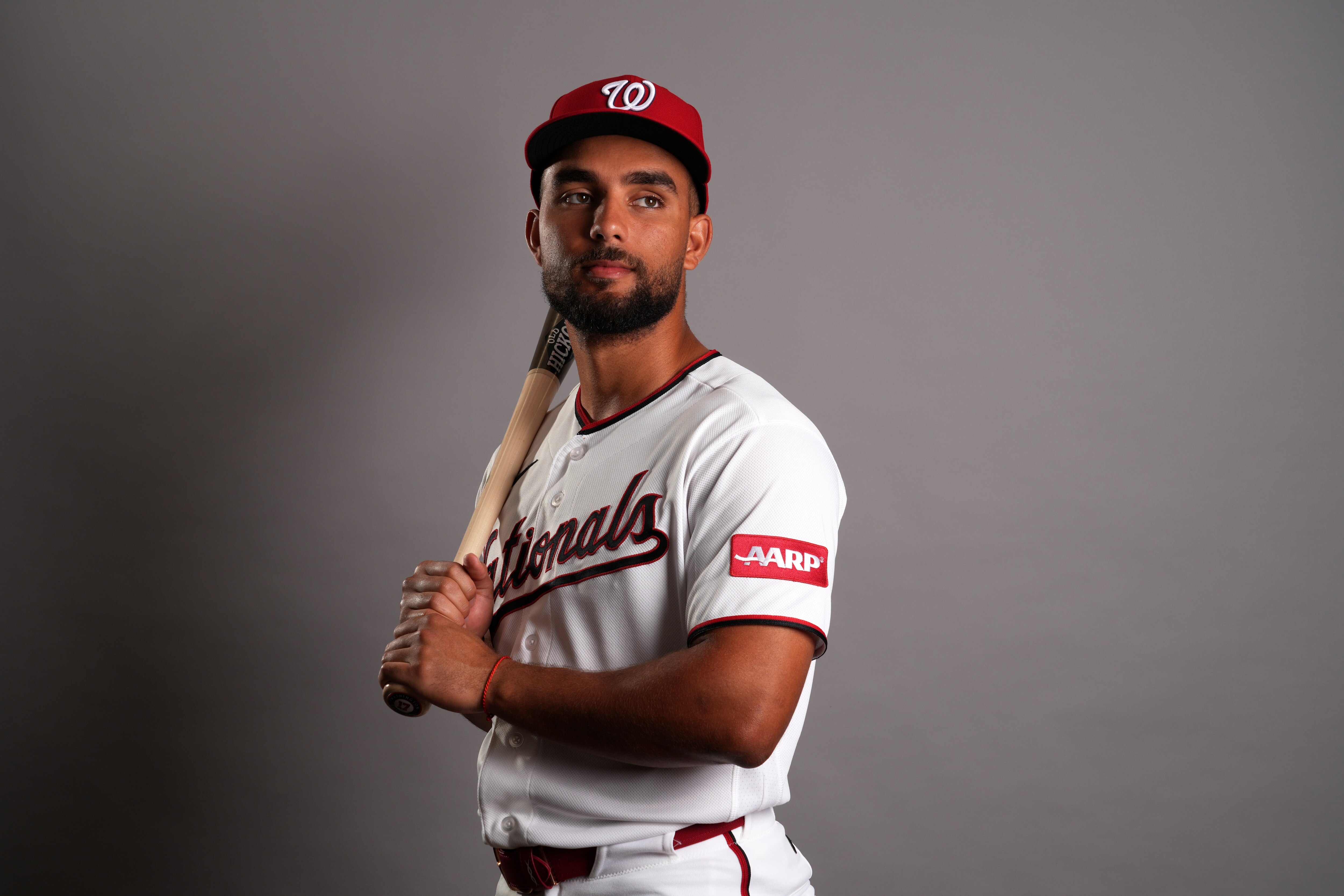 Washington Nationals catching prospect Harry Ford poses with a bat on his shoulder.