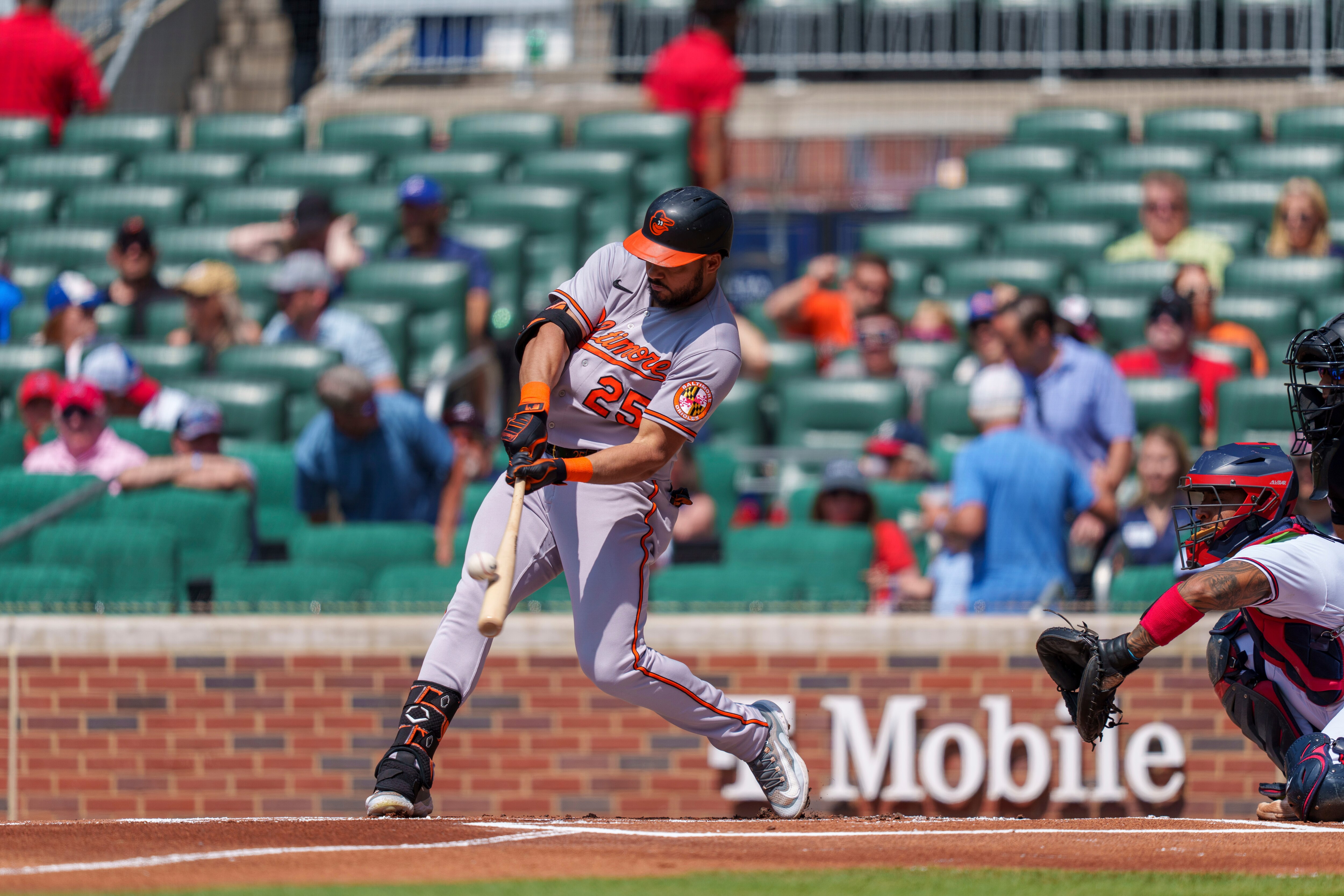 Baltimore Orioles' Anthony Santander hits the ball in the first inning of a baseball game against the Atlanta Braves on Sunday, May 7, 2023, in Atlanta. (AP Photo/Erik Rank)