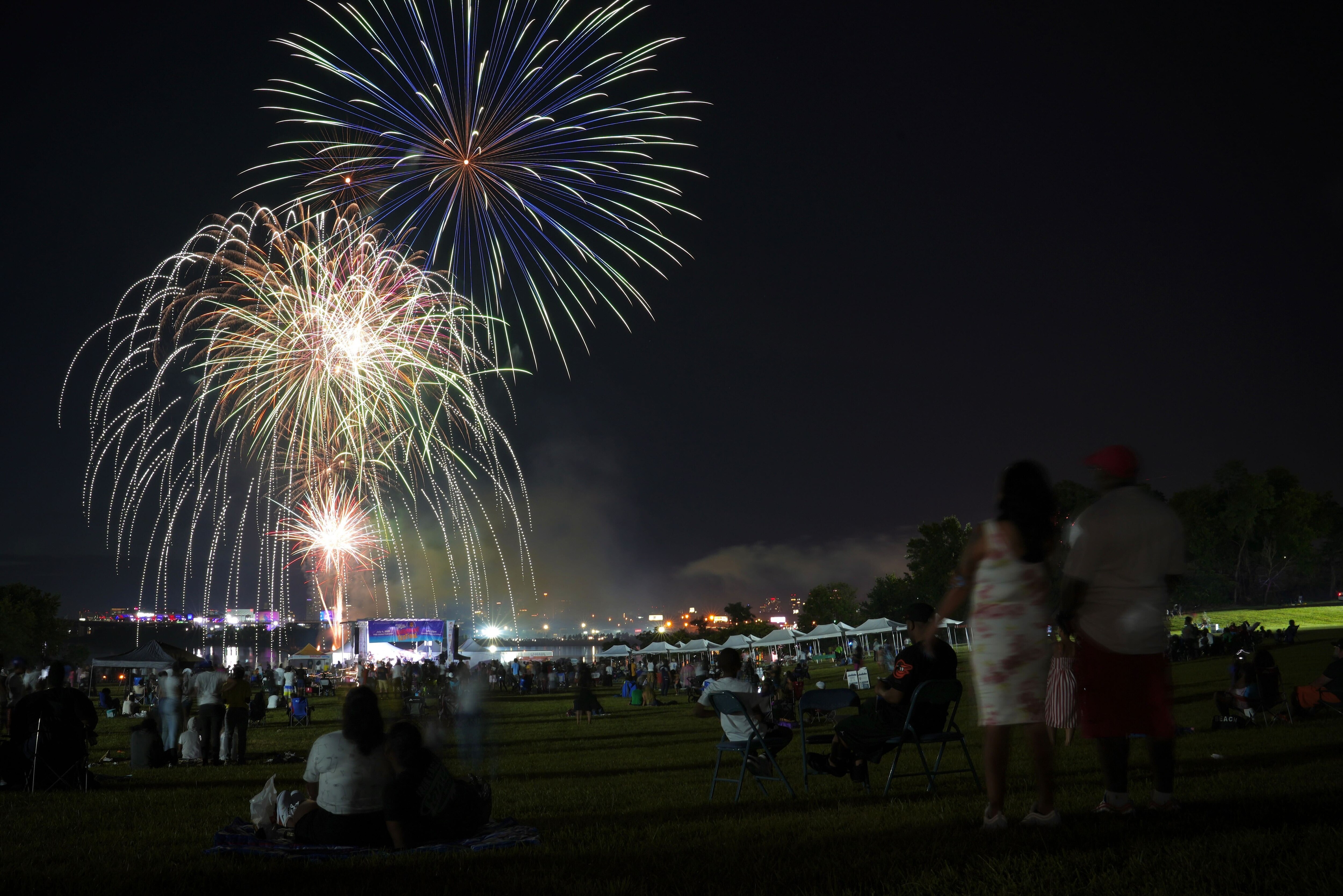 Fireworks light up the sky at the Cherry Hill Arts & Music Waterfront Festival on July Fourth, 2022.