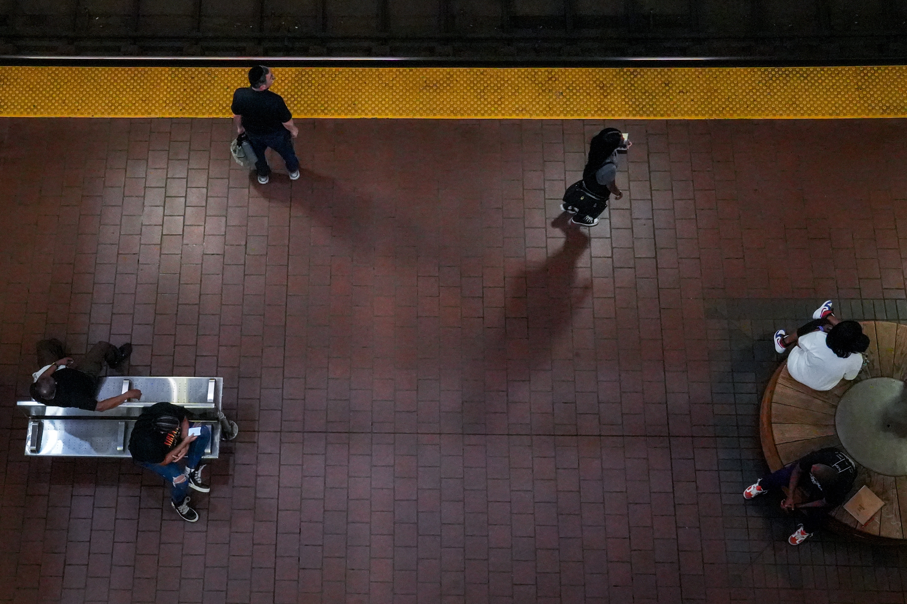 Interior of Charles Center Station as riders wait to board the subway on Aug. 11, 2022.