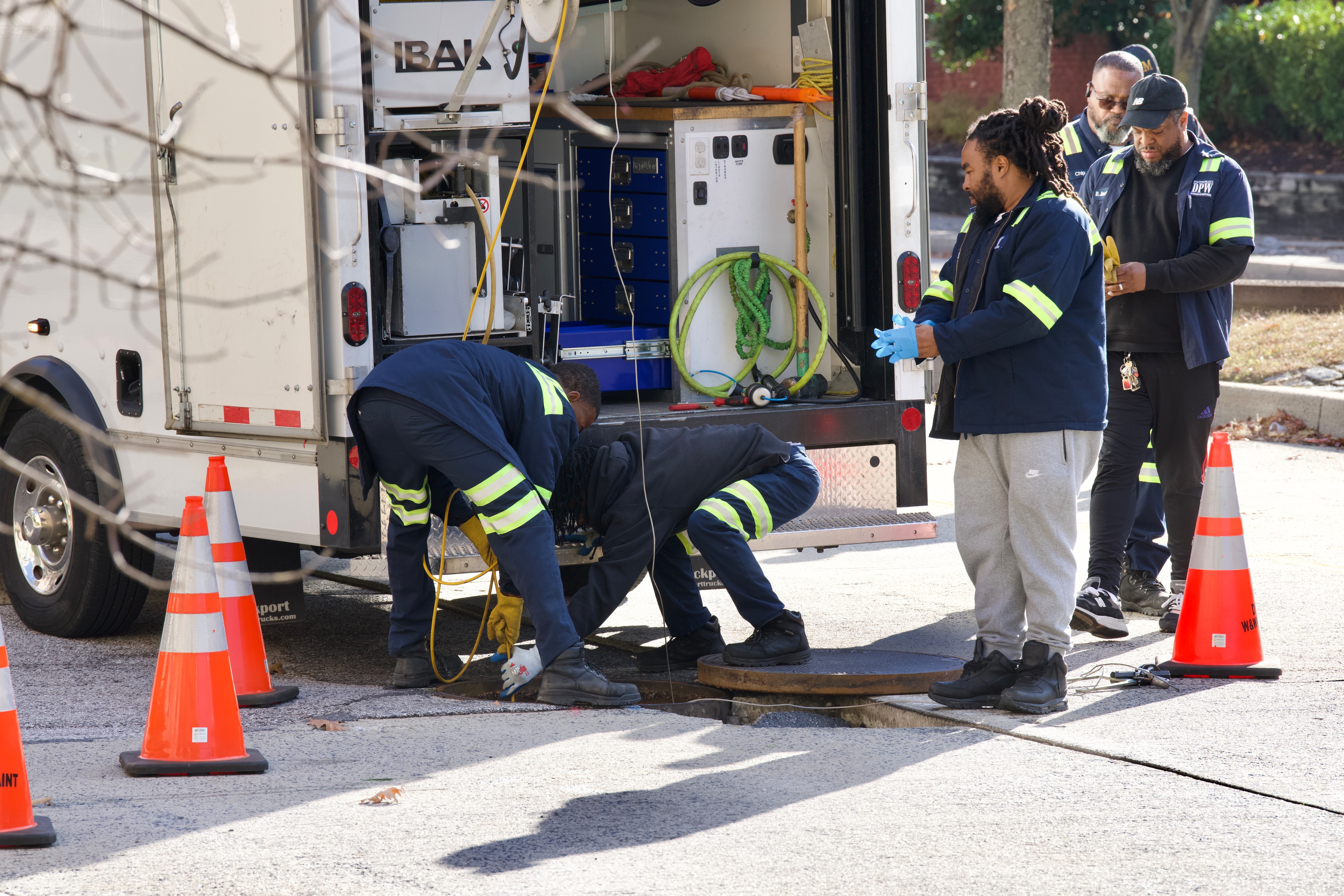The Department of Public Works responds to a potential sinkhole on Key Highway in Baltimore, near the American Visionary Art Museum.