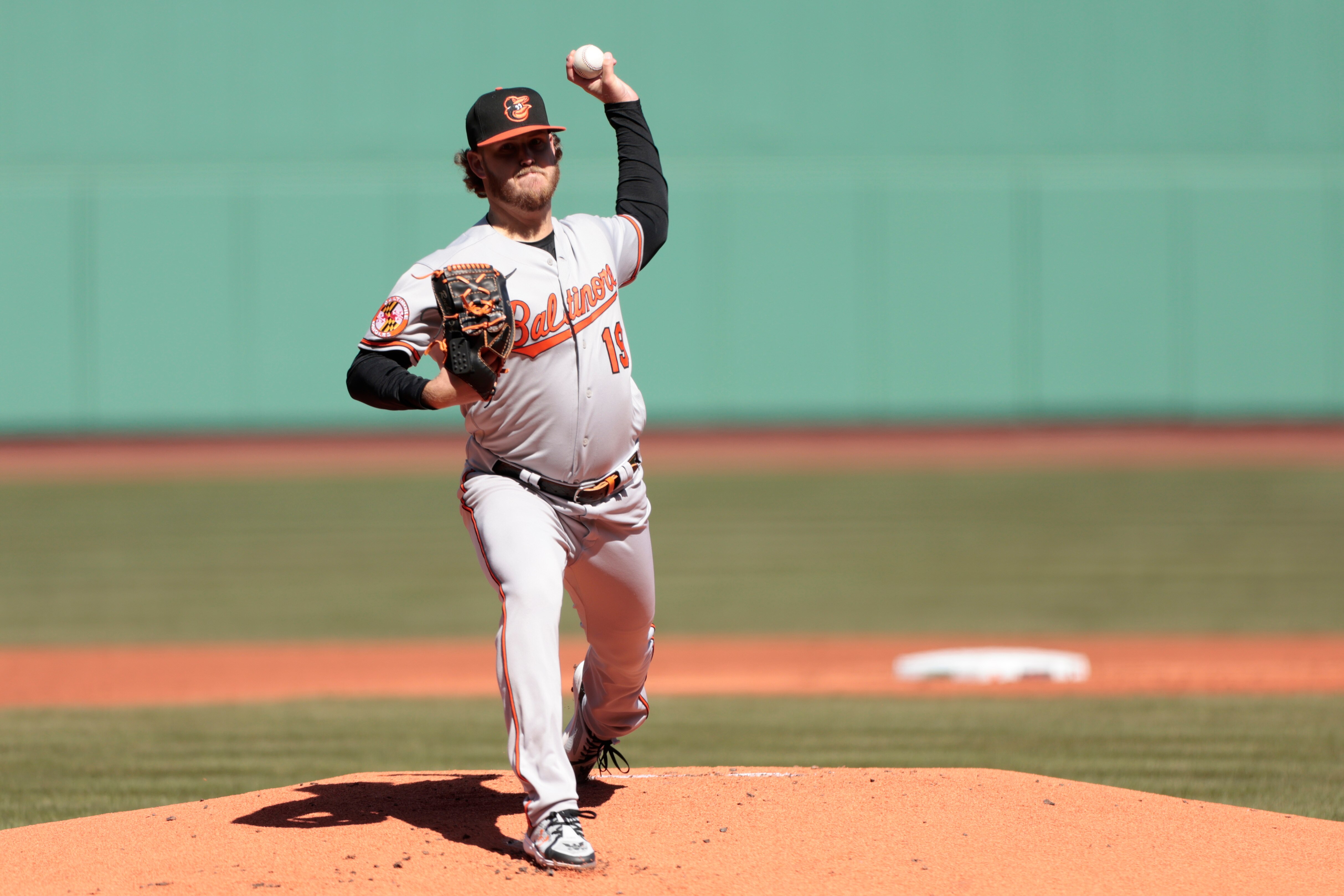 BOSTON, MASSACHUSETTS - APRIL 02: Cole Irvin #19 of the Baltimore Orioles delivers a pitch during the first inning against the Boston Red Sox at Fenway Park on April 02, 2023 in Boston, Massachusetts. (Photo by Nick Grace/Getty Images)