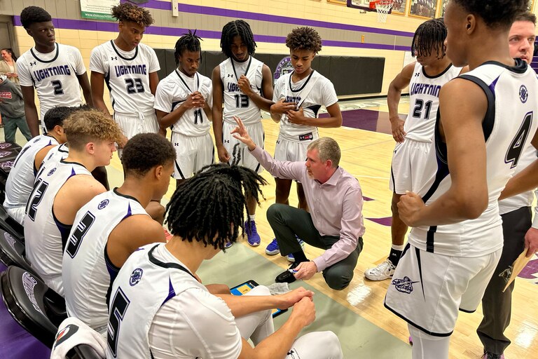 Long Reach boys basketball coach Andrew Lazzor addresses his team during a timeout in Wednesday's 79-41 win over Hammond as the Lightning improved to 4-0 for the first time since 2007-08.