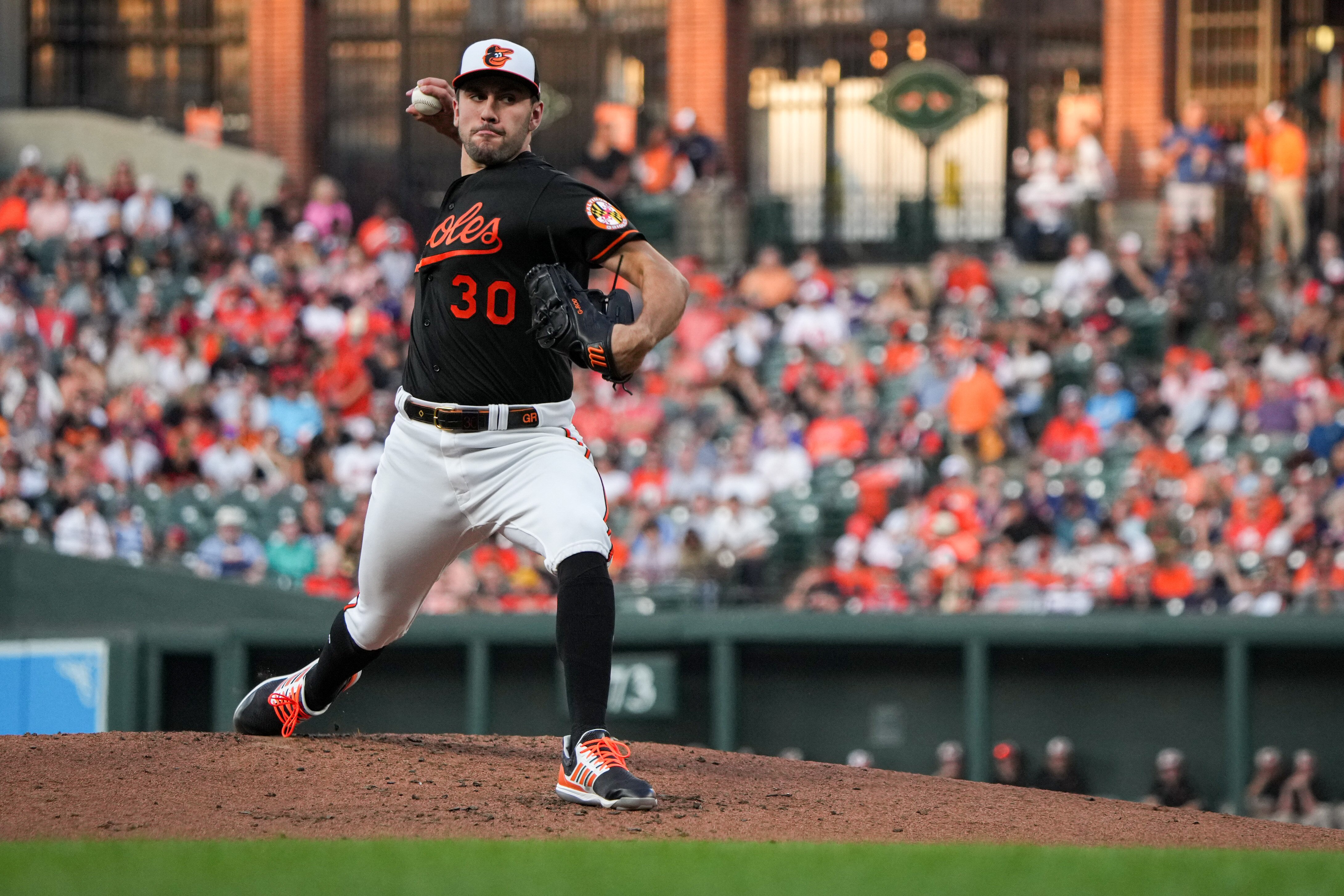 Baltimore Orioles starting pitcher Grayson Rodriguez (30) pitches in the second inning of a baseball game against the Houston Astros at Orioles Park at Camden Yards in Baltimore on Aug. 8, 2023.