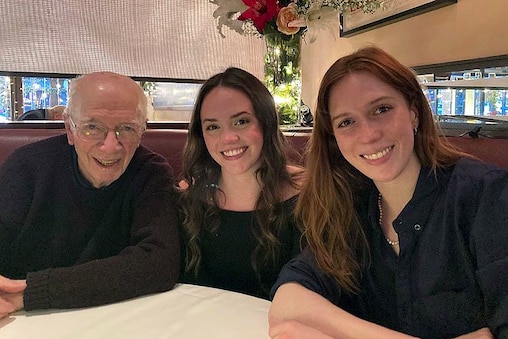 John O’Hagan with his granddaughters, Caroline and Sarah Adams, in New York after going to the theater in 2023.