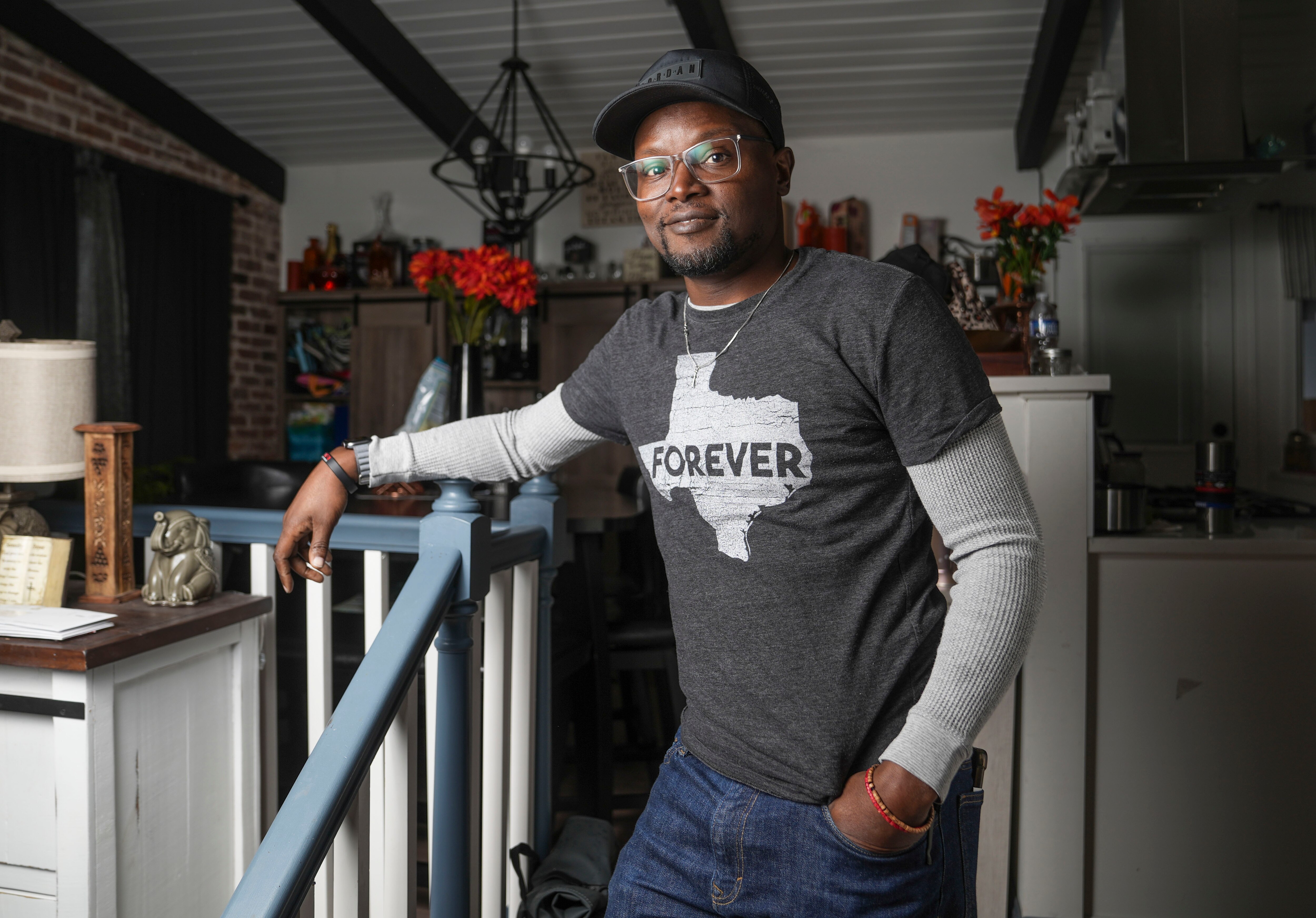 Christopher Smith poses for a portrait inside of his home in Baltimore, Friday, April 28, 2023.