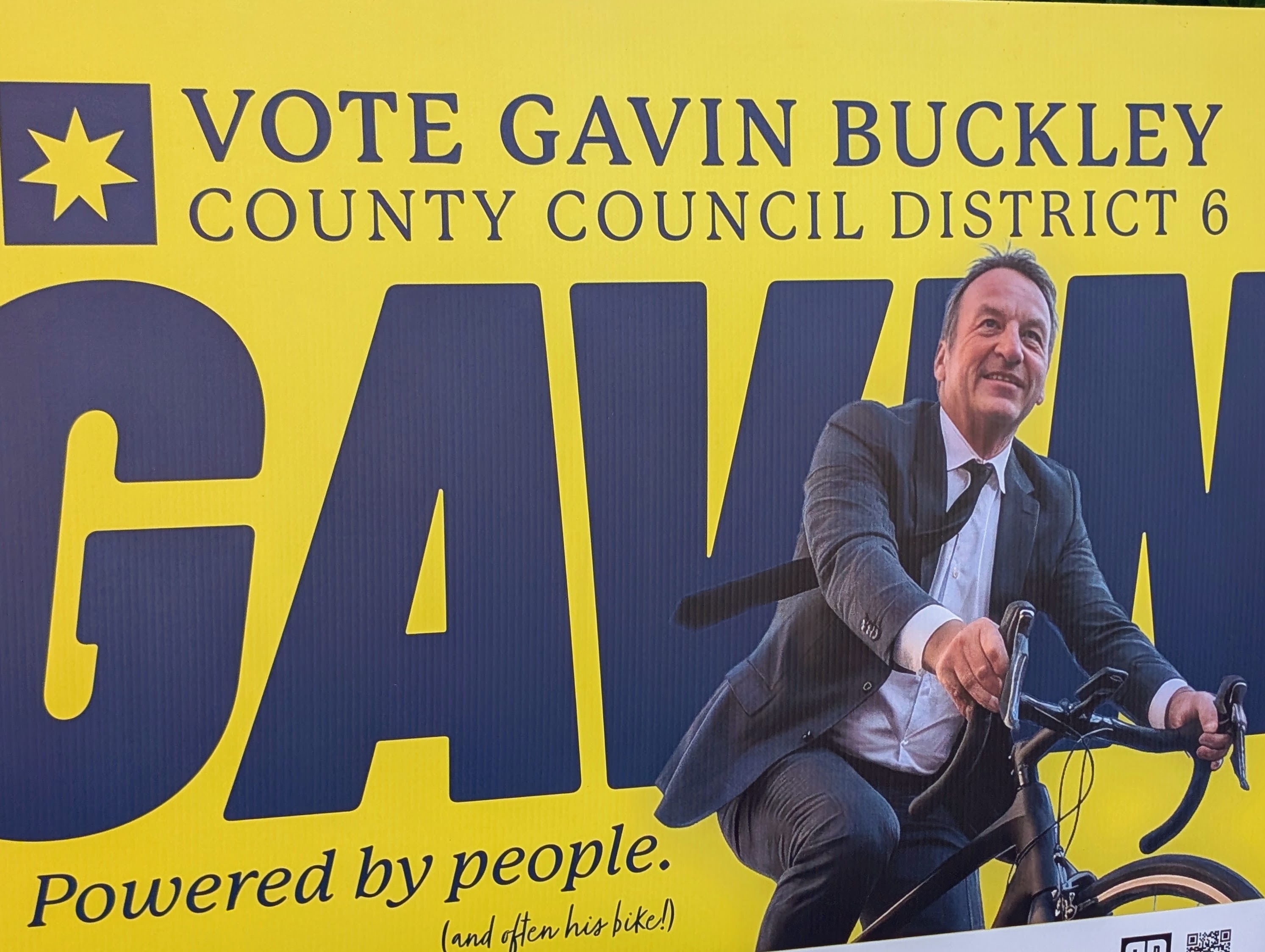 Former mayor Gavin Buckley's new campaign signs for county council feature him on a bike, an image familiar to many after eight years in office.