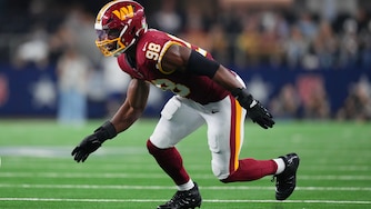 Washington Commanders linebacker Odafe Oweh (98) rushes in during an NFL football game between the Dallas Cowboys and the Washington Commanders in Arlington, Texas, Sunday, Sept. 20, 2026. (AP Photo/Julio Cortez)